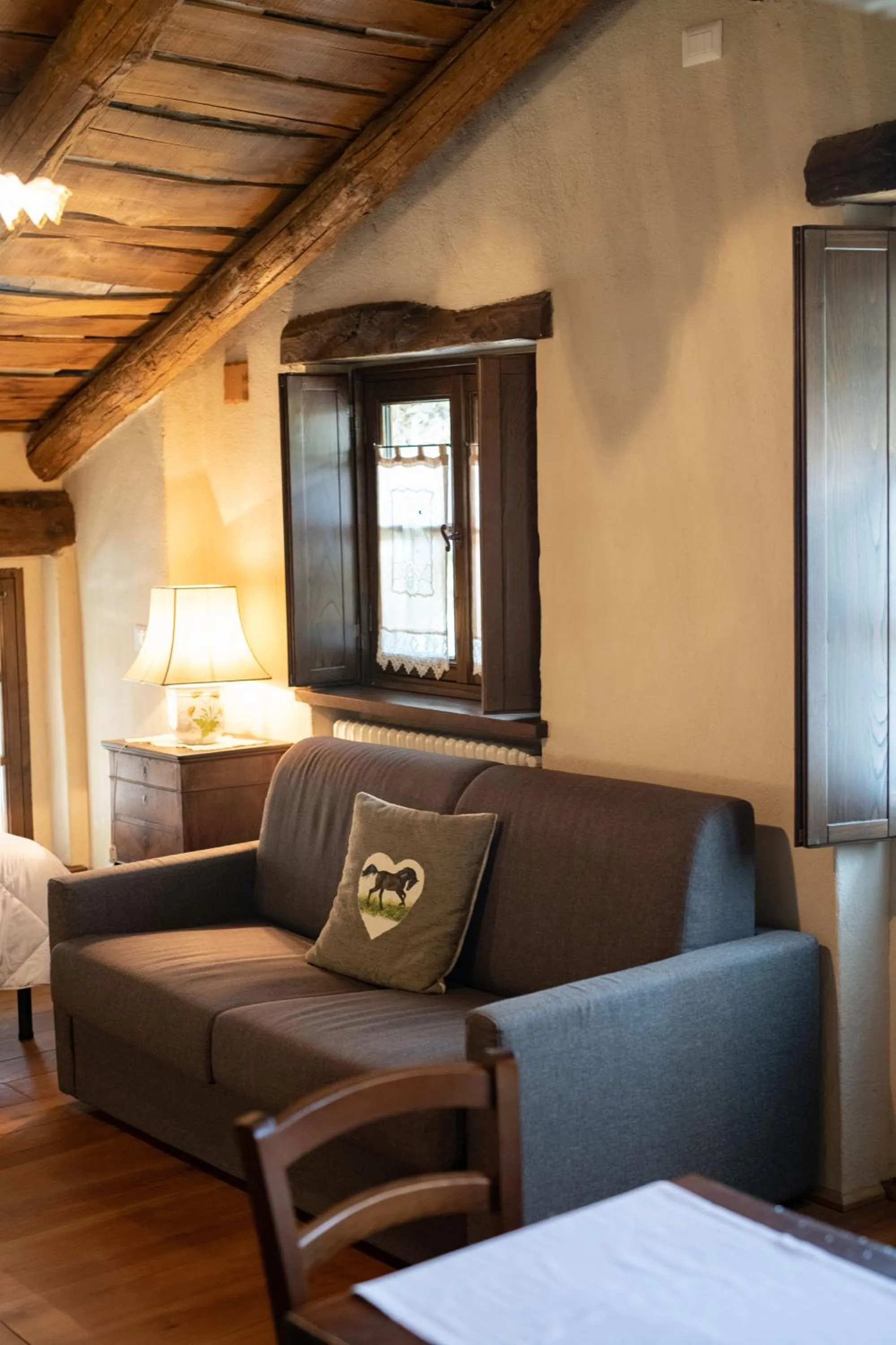 Seating area, Bed in Il Sogno Della Vita AgriResort - Country Rooms & Suites