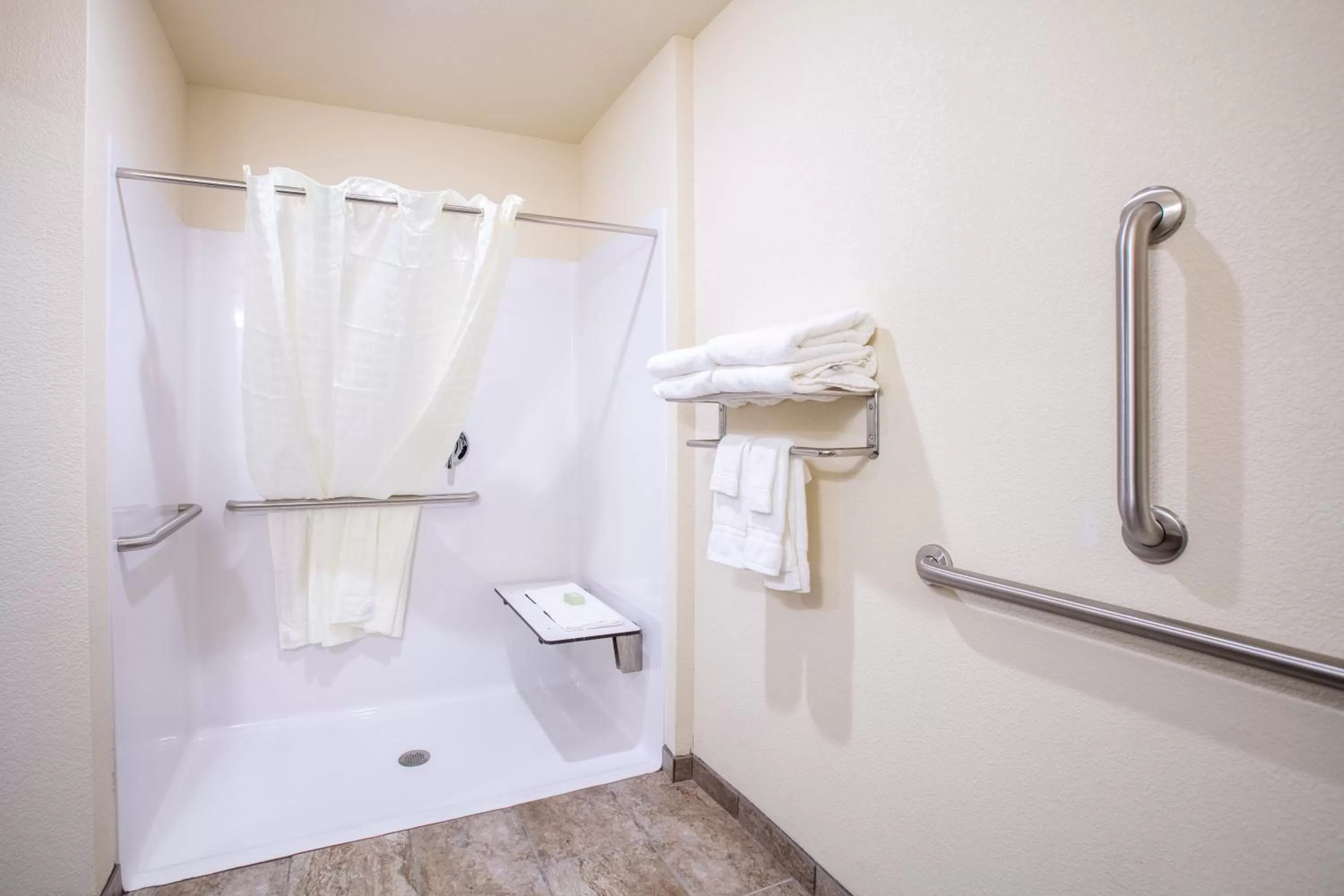 Shower in Cobblestone Inn & Suites - Pine Bluffs