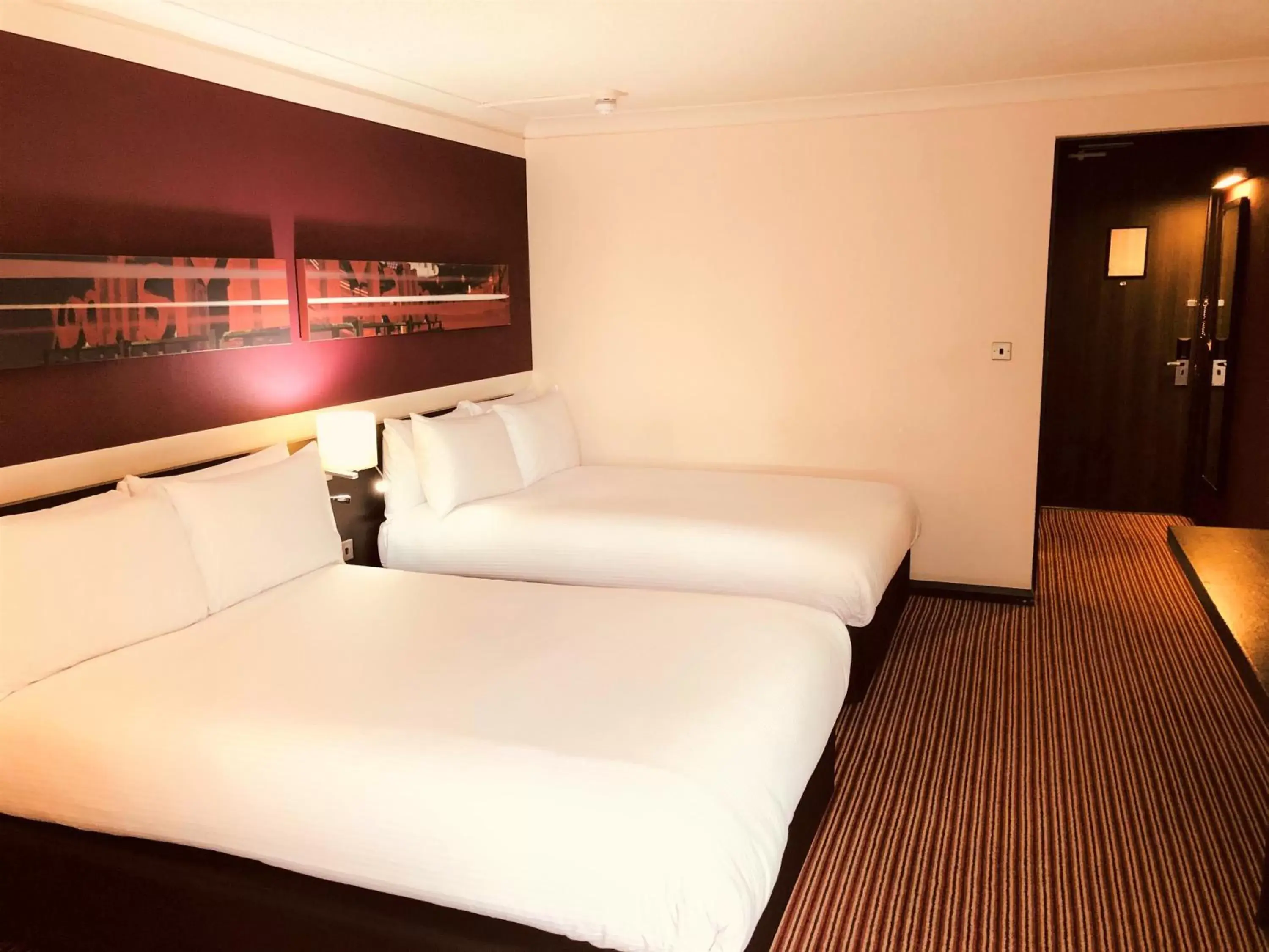 Photo of the whole room, Bed in Crowne Plaza Birmingham City, an IHG Hotel