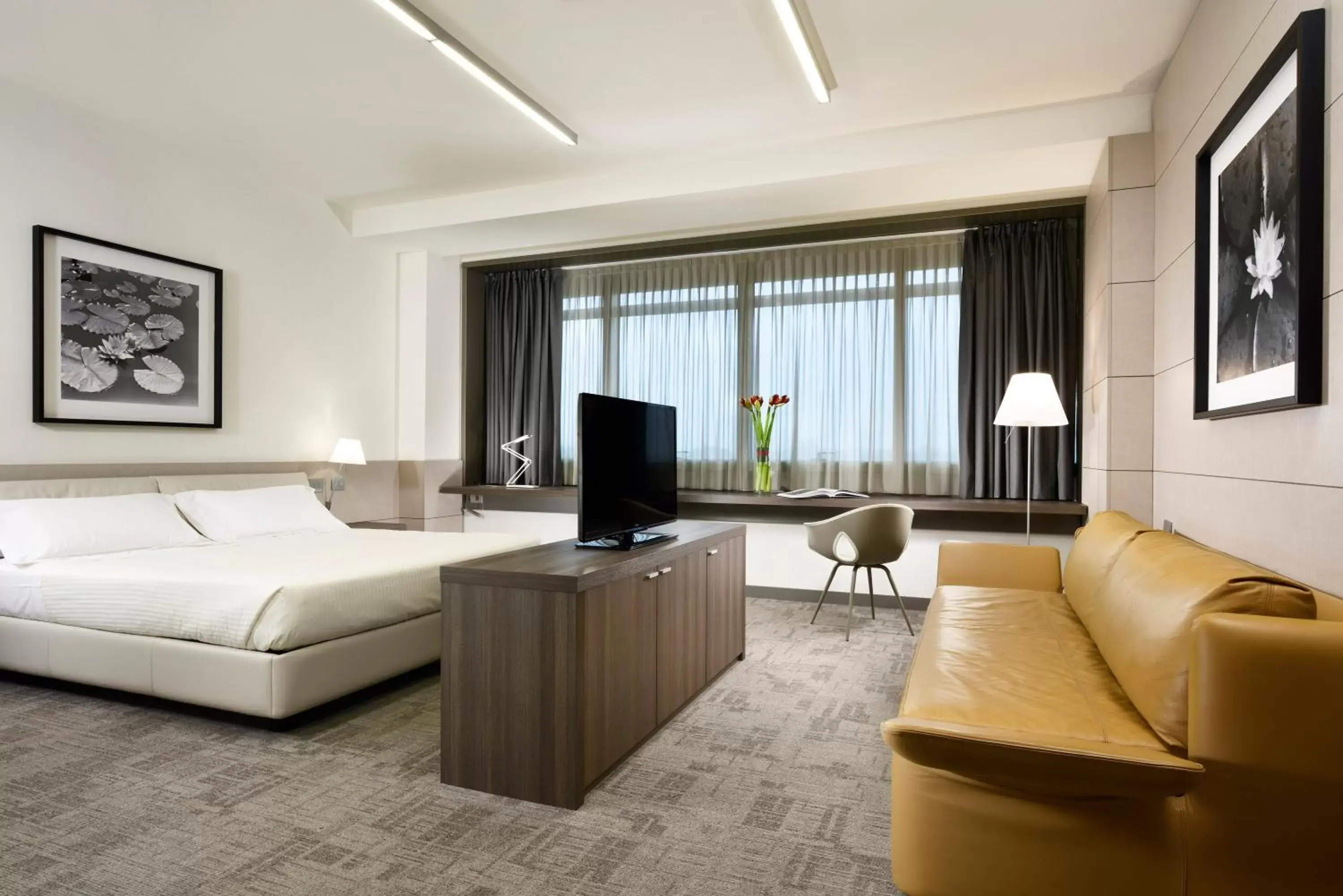 Bed, Seating Area in UNAHOTELS San Vitale Bologna