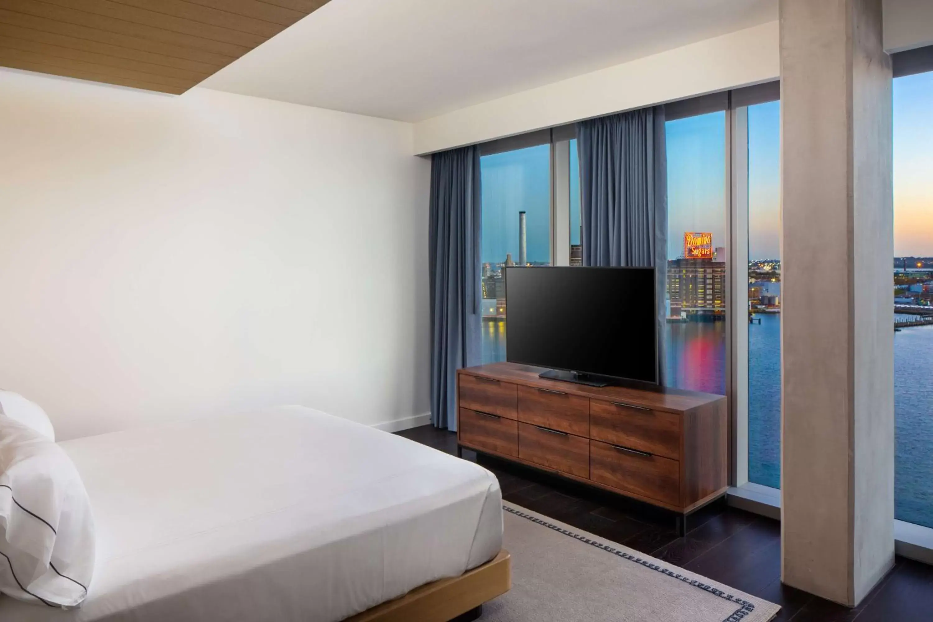 Bed, TV/Entertainment Center in Canopy By Hilton Baltimore Harbor Point - Newly Built