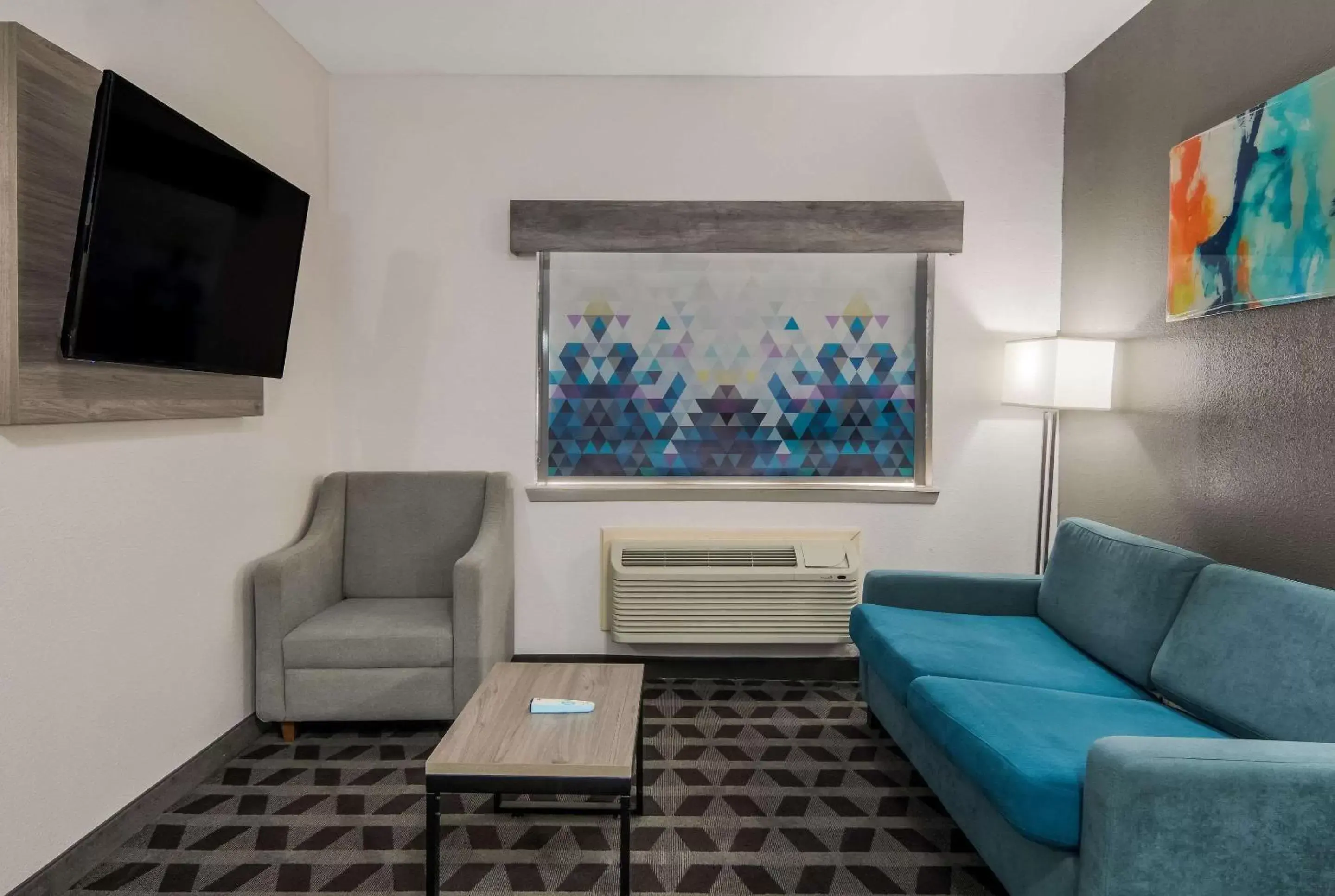 Bedroom, Seating Area in Quality Inn & Suites