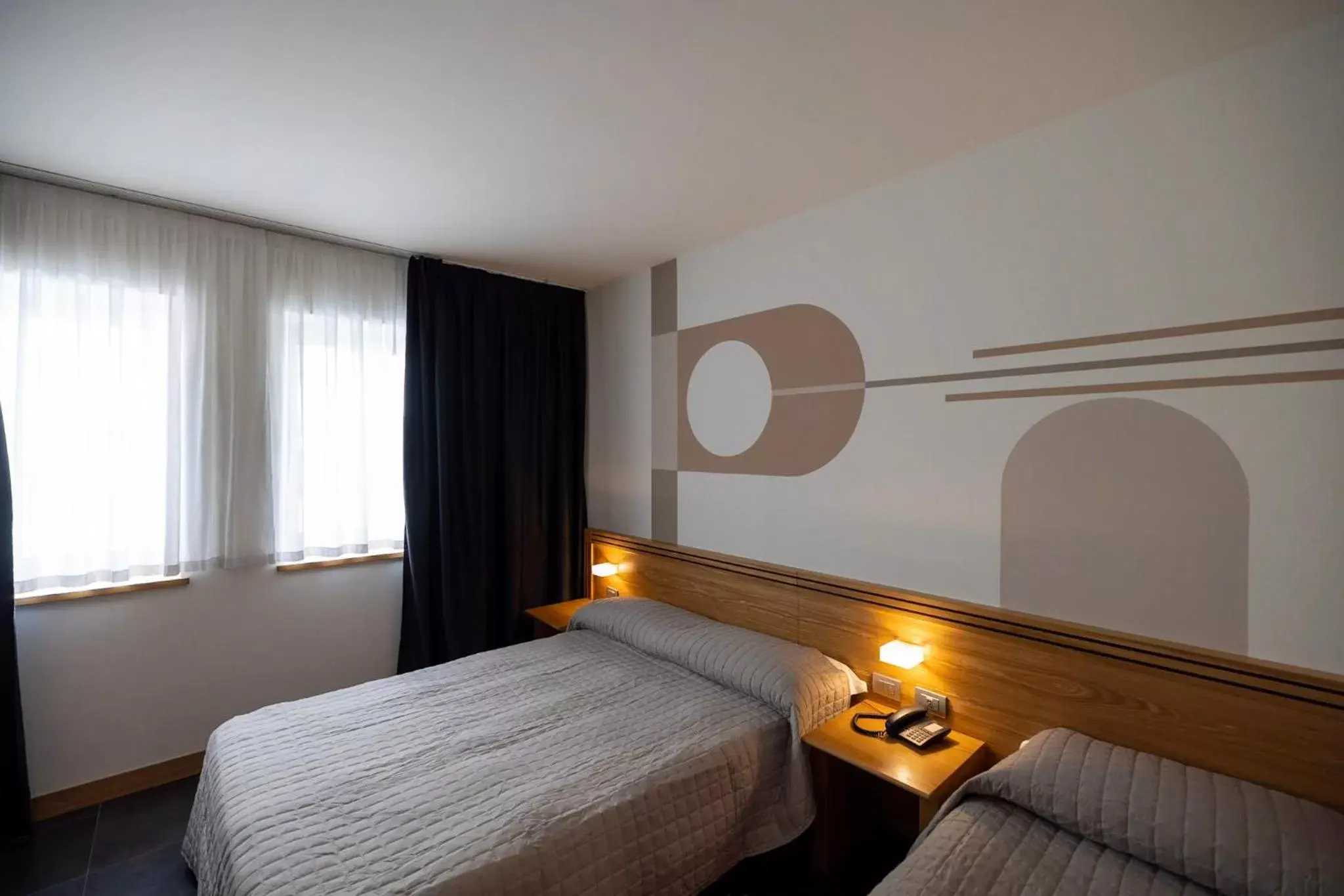 Bed in Hotel Europa Belluno