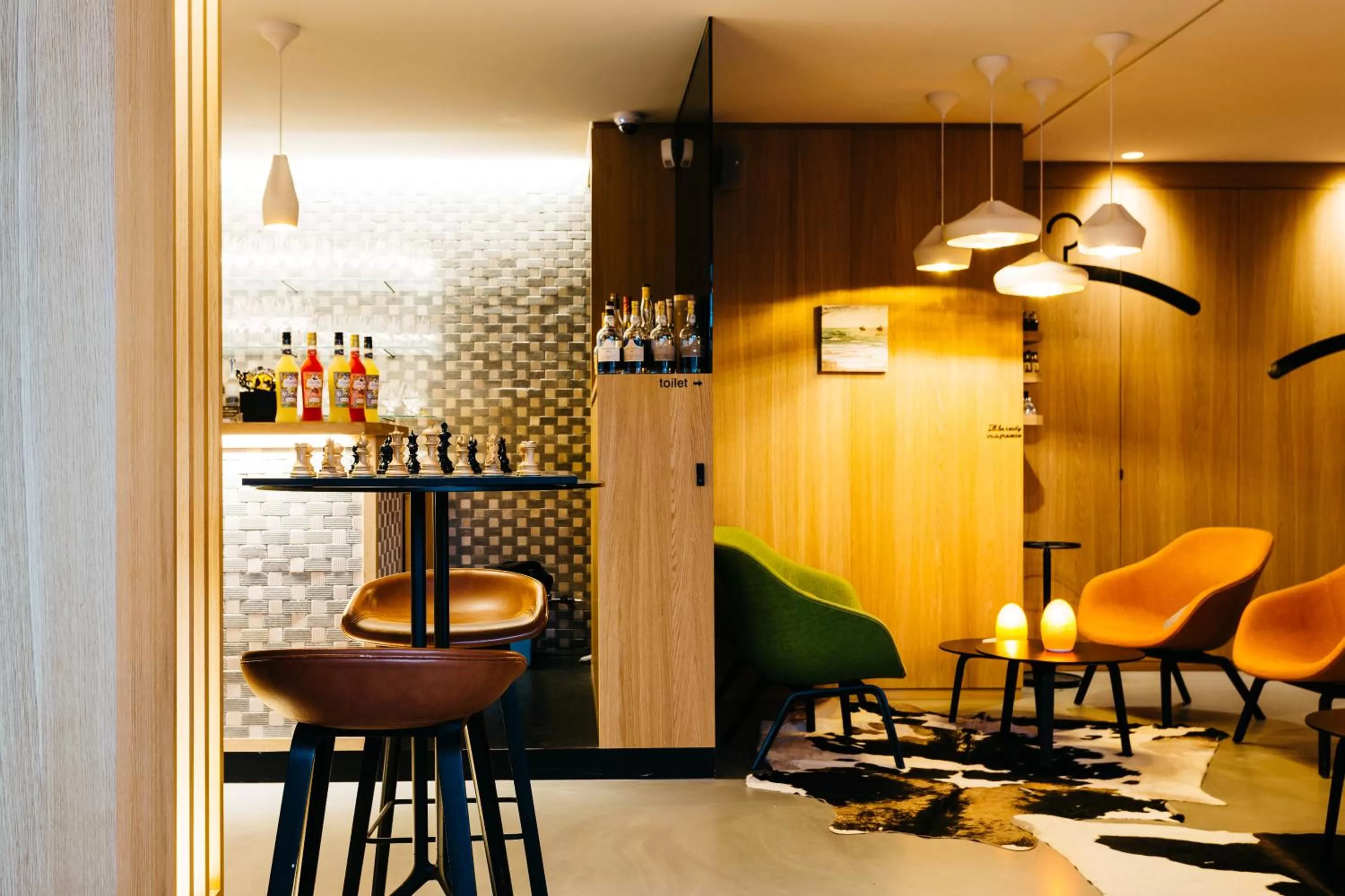 Lounge or bar in Boutique Hotel 'Hof ter Duinen'