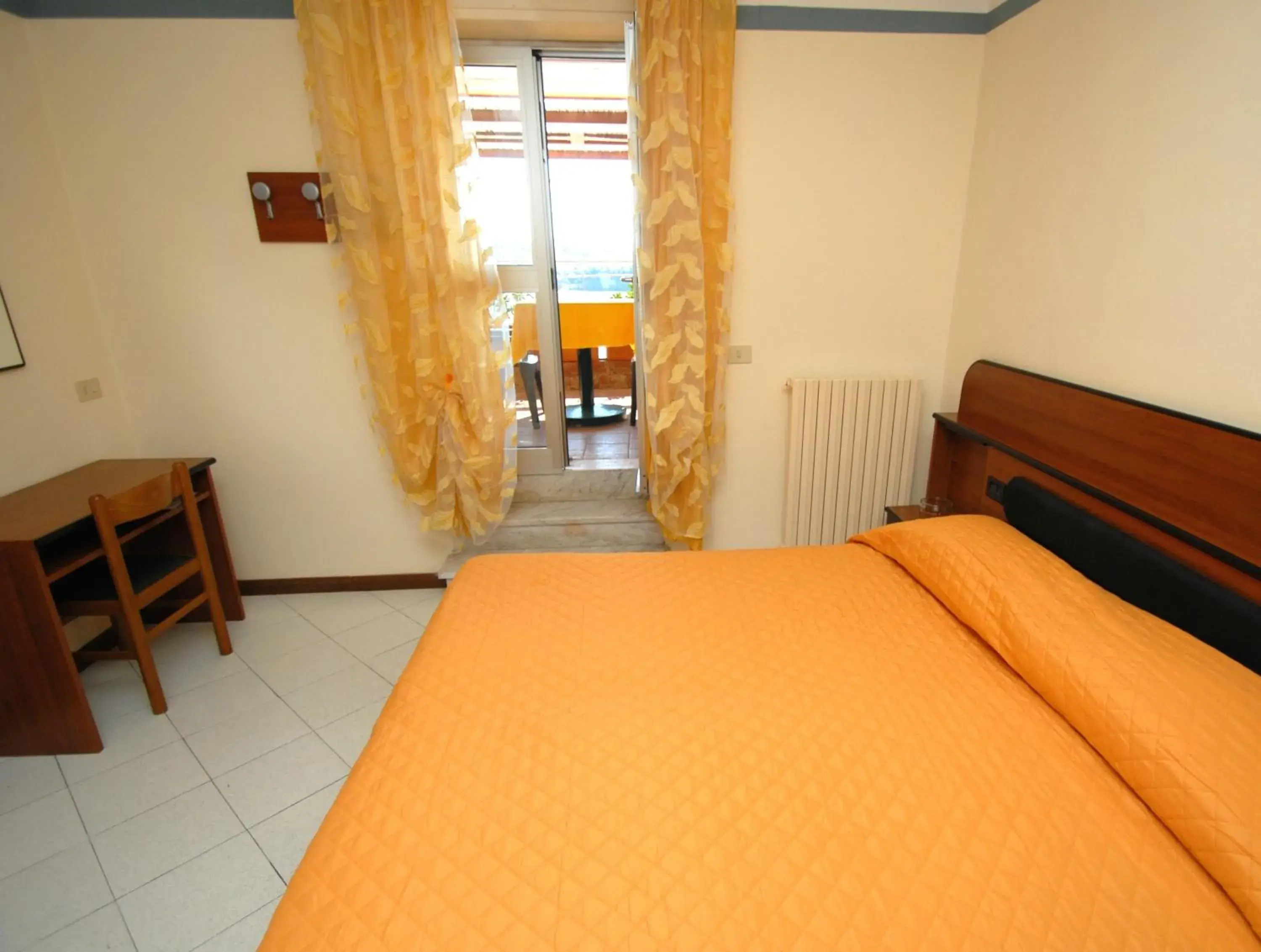 Bed in Hotel Baia Del Sorriso Bed in Hotel Baia Del Sorriso