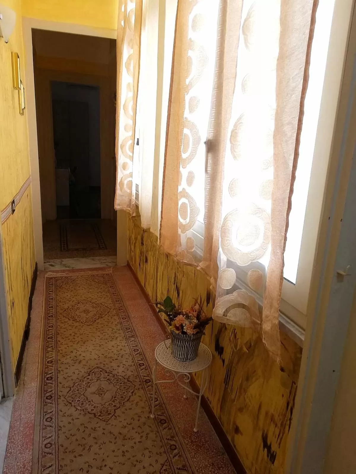 Communal lounge/ TV room in B&B Orchidea