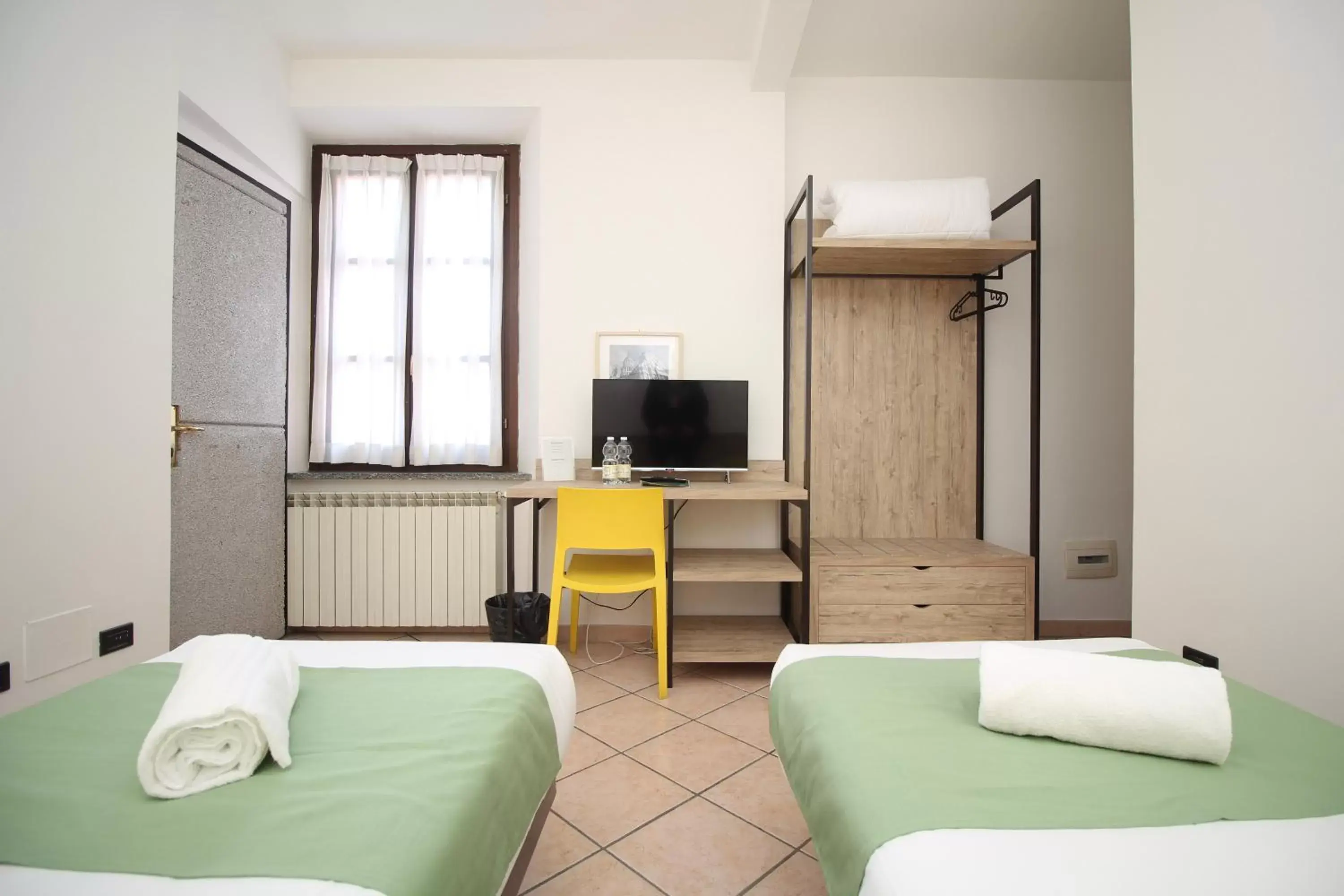 Bedroom, TV/Entertainment Center in Hotel Tornielli 9