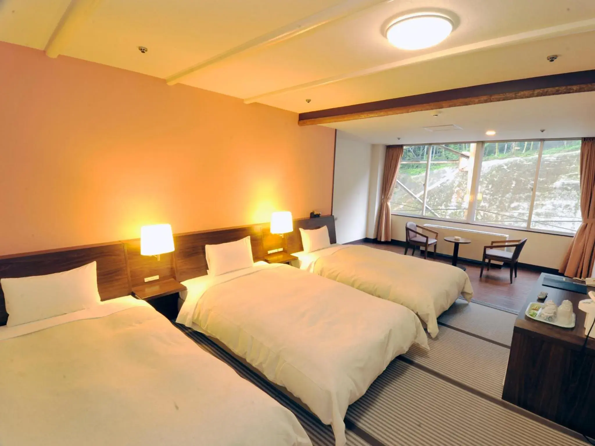 Photo of the whole room, Bed in Nagasaki Nisshokan Hotel