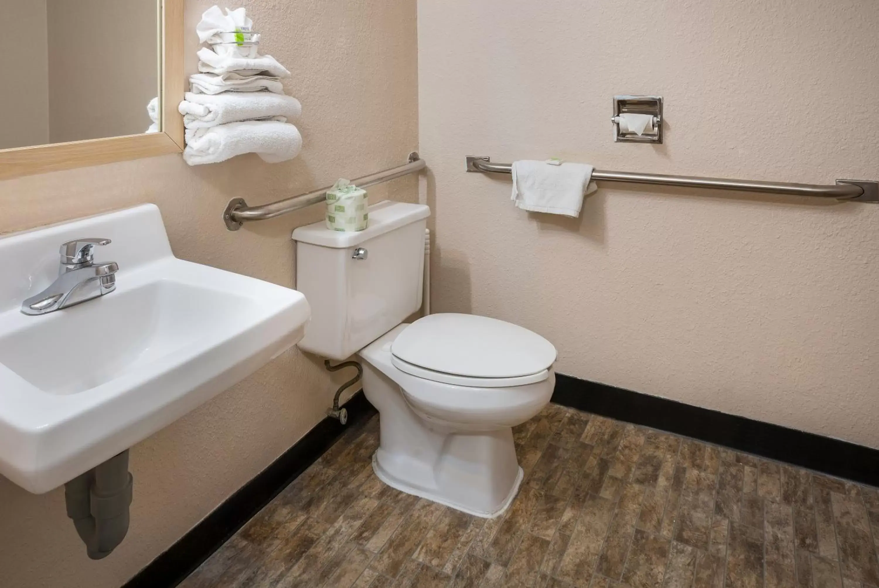 Toilet, Bathroom in Knights Inn Grand Rapids East Airport