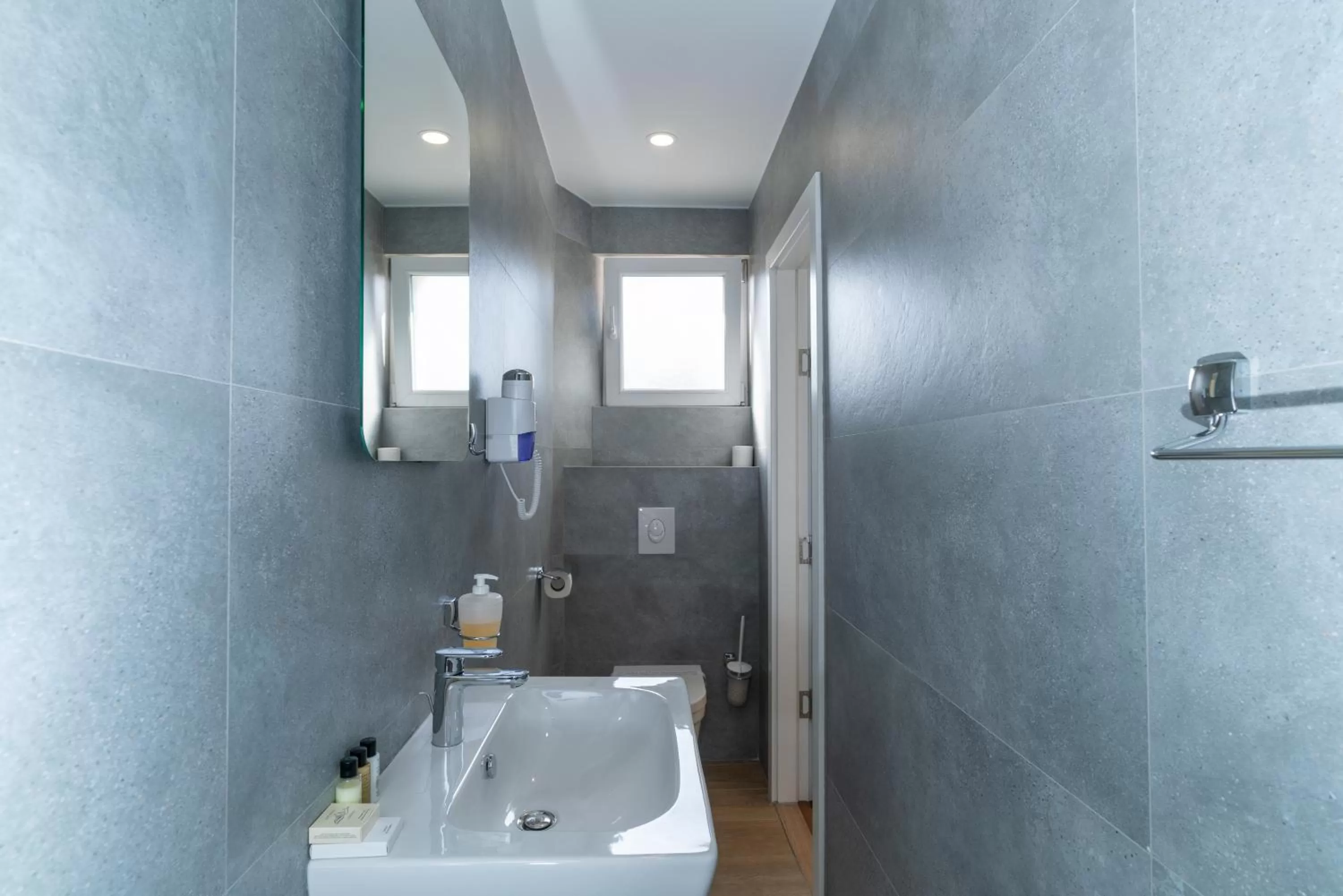 Bathroom in Ornament Hotel and Apartments