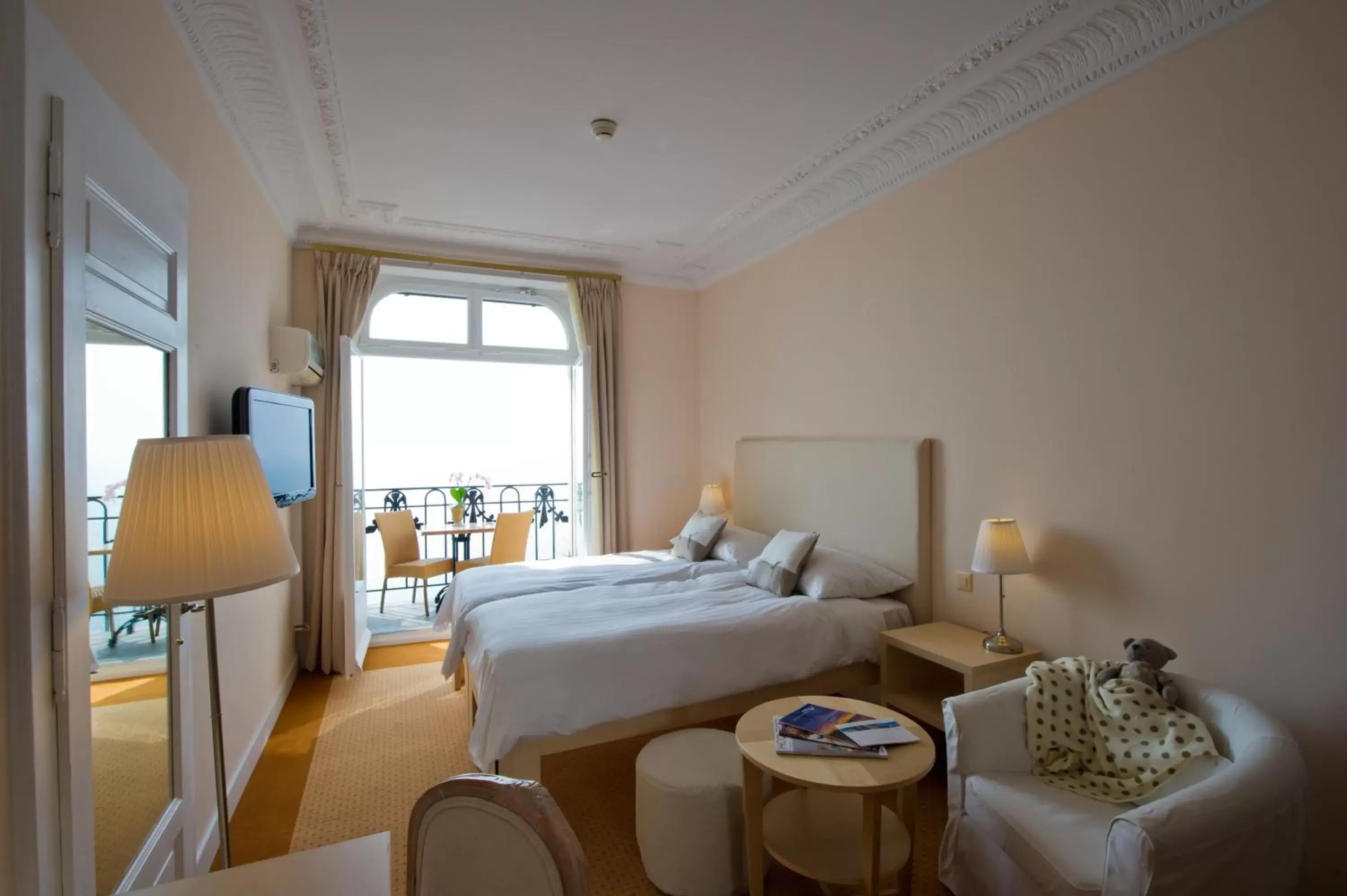 Bed in Hôtel du Grand Lac Excelsior Bed in Hôtel du Grand Lac Excelsior