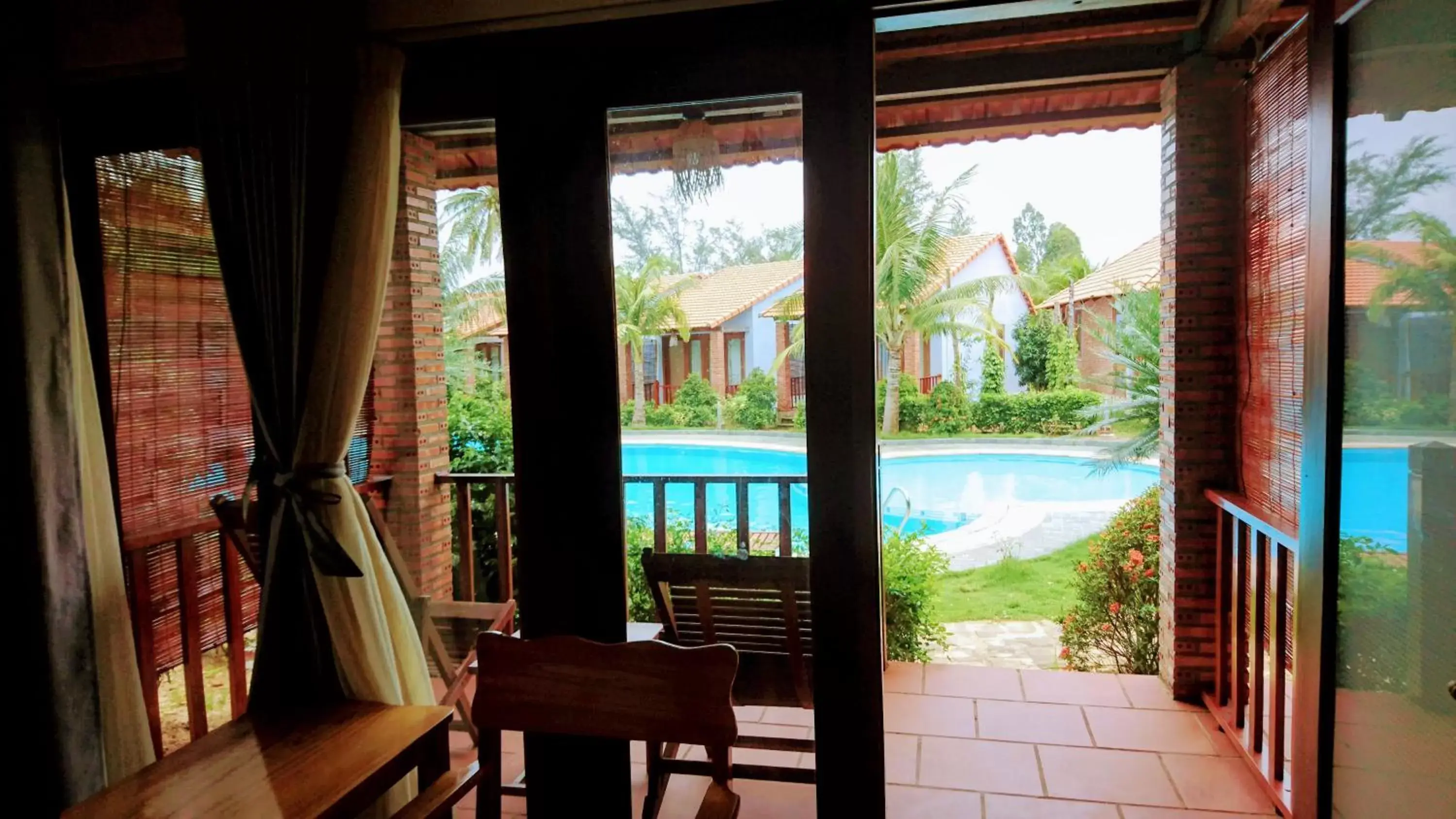 Balcony/Terrace, Pool View in Wildland Resort