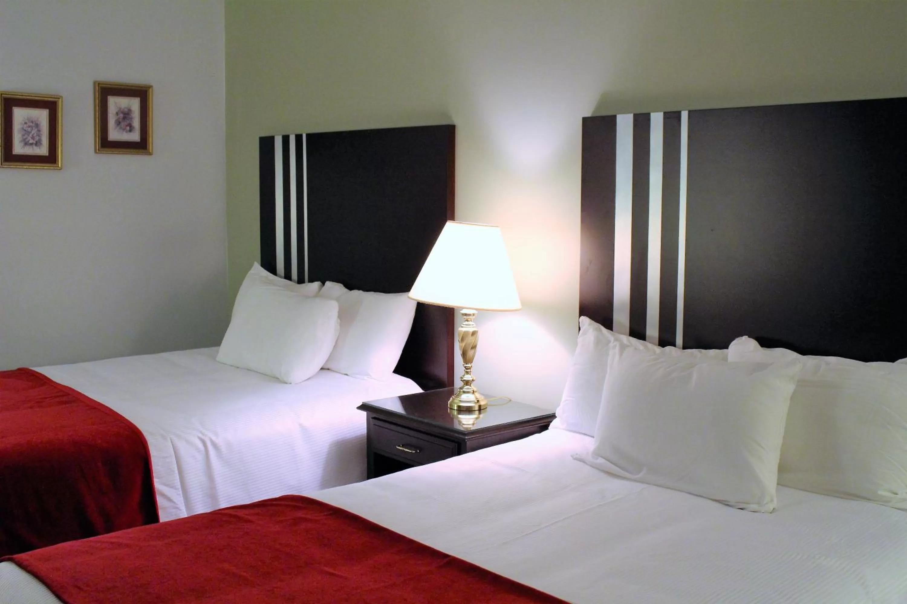 Bed in Auberge Gisele's Inn