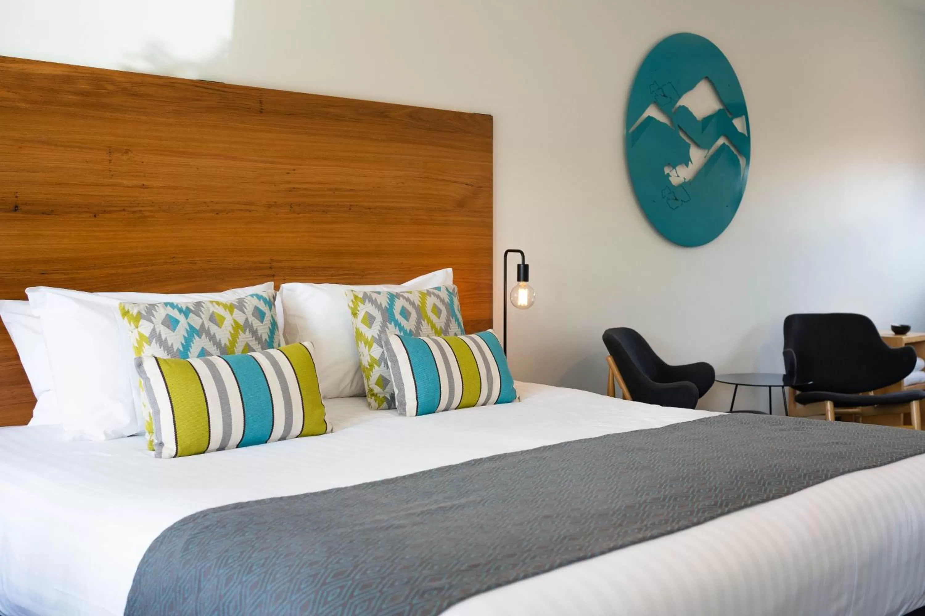 Bed in Bright Colonial Motel