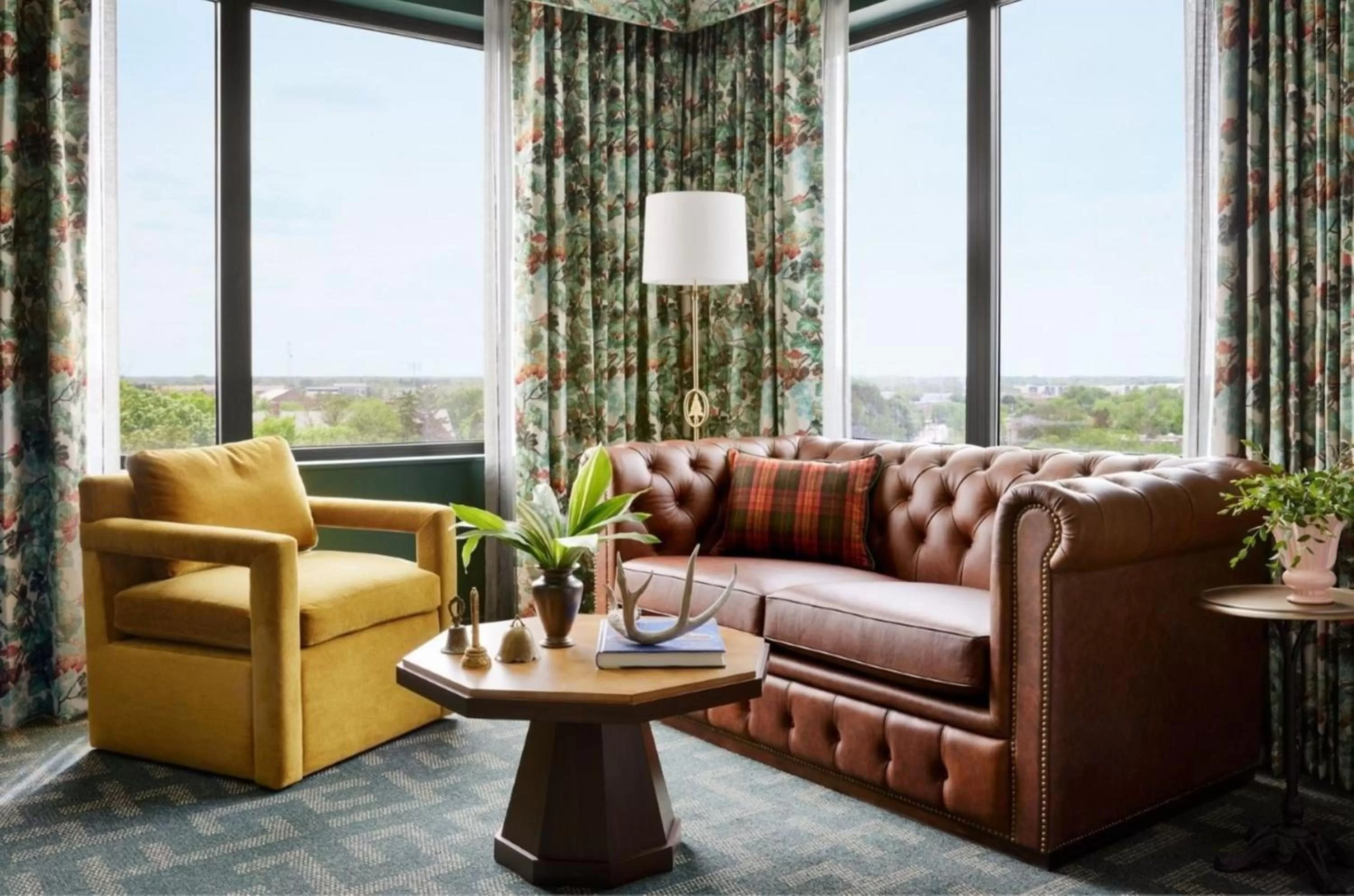 Living room in Graduate by Hilton East Lansing