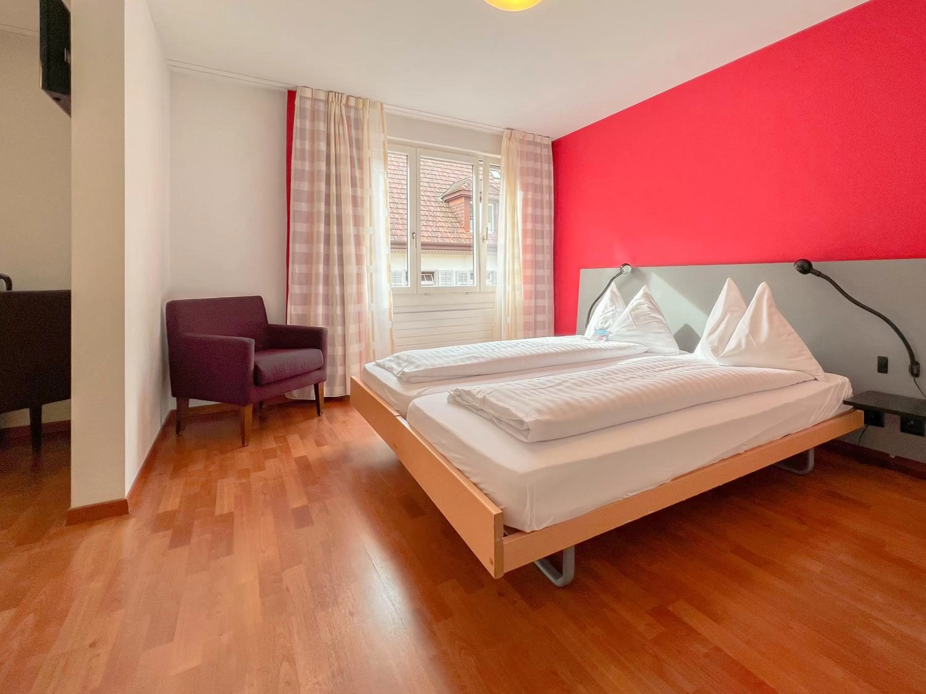 Bed in Hotel Rothaus Luzern & Peruvian Culinary Art