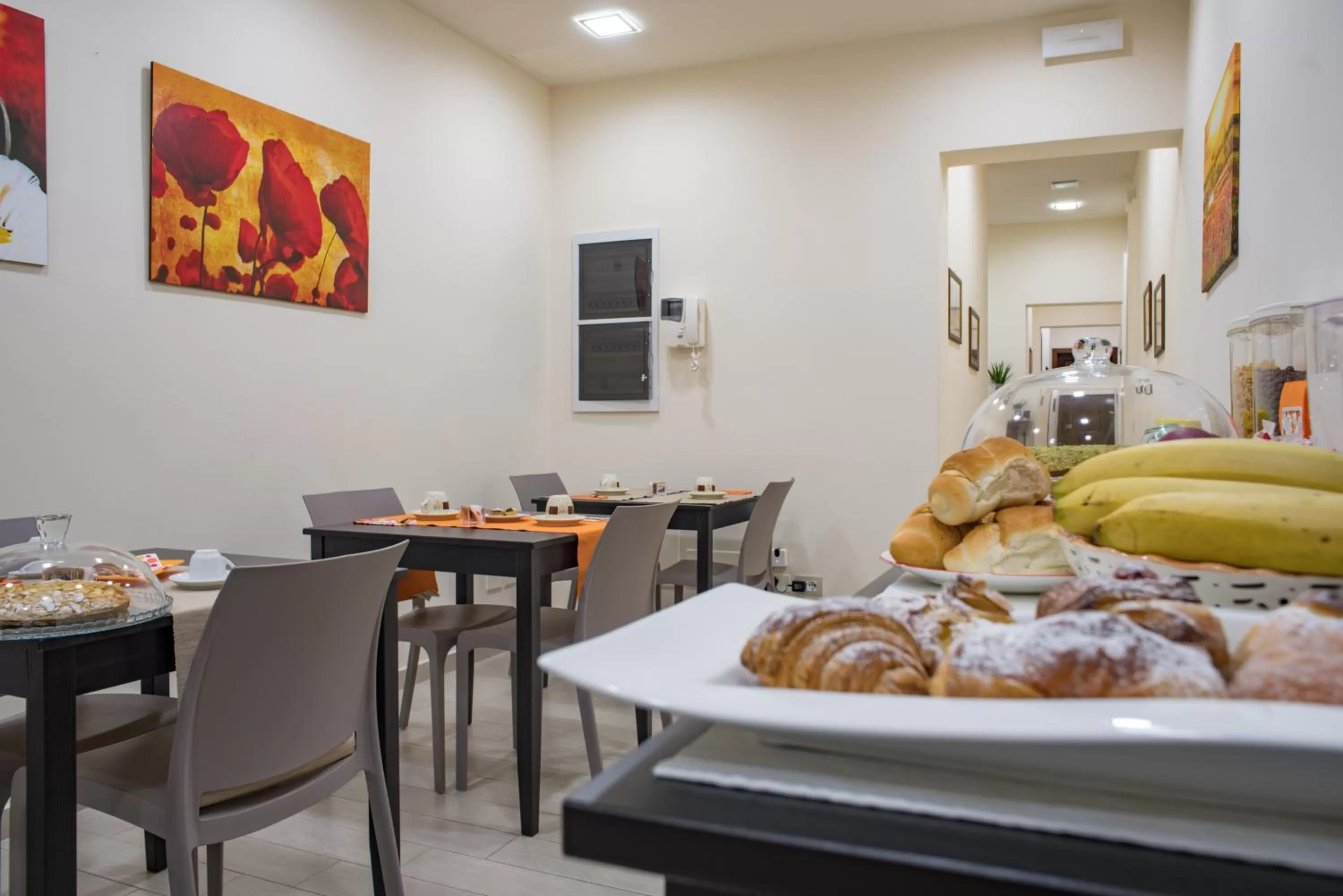 Communal lounge/ TV room in B&B Palazzo Tornabene