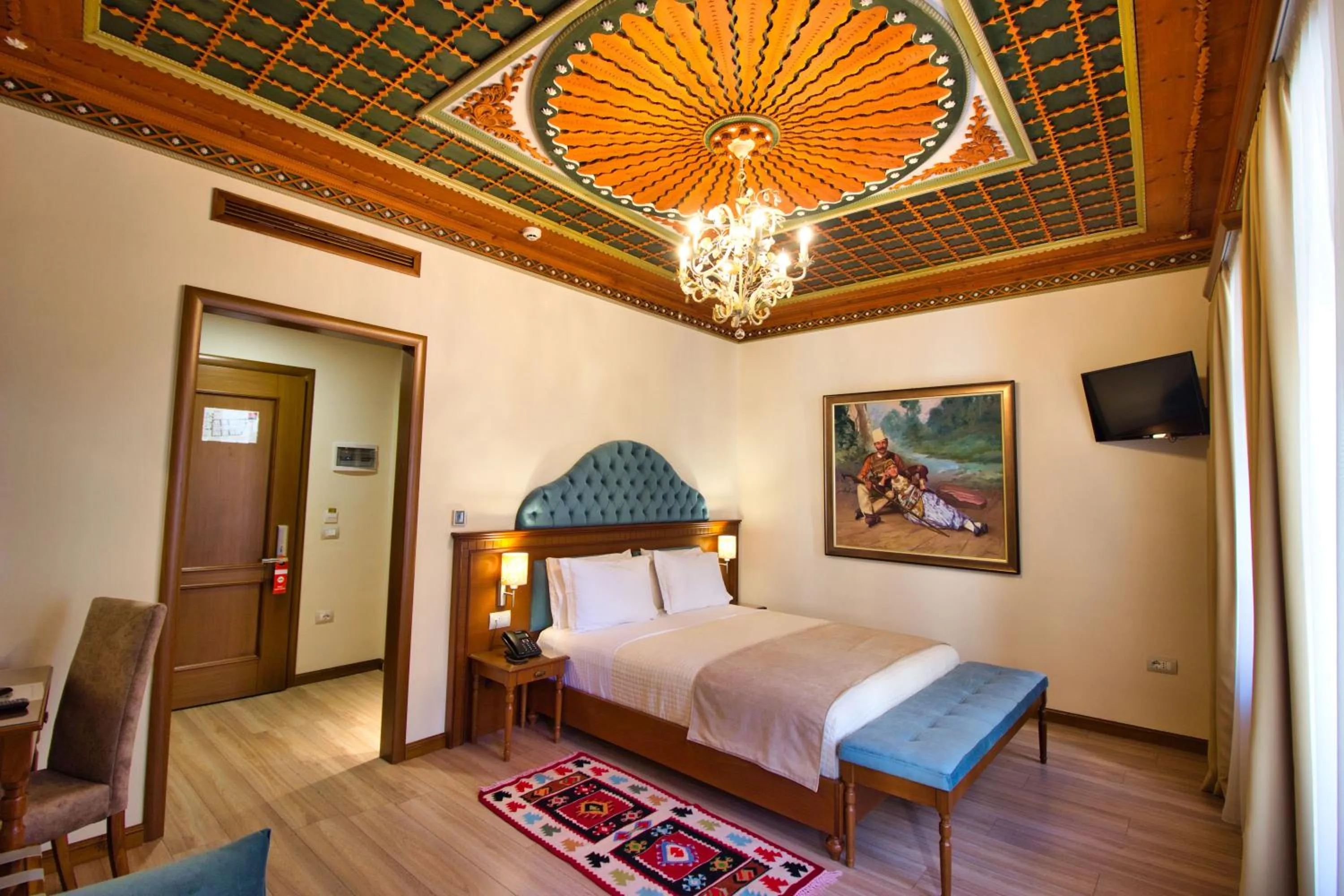 Bed in Hotel Argjiro