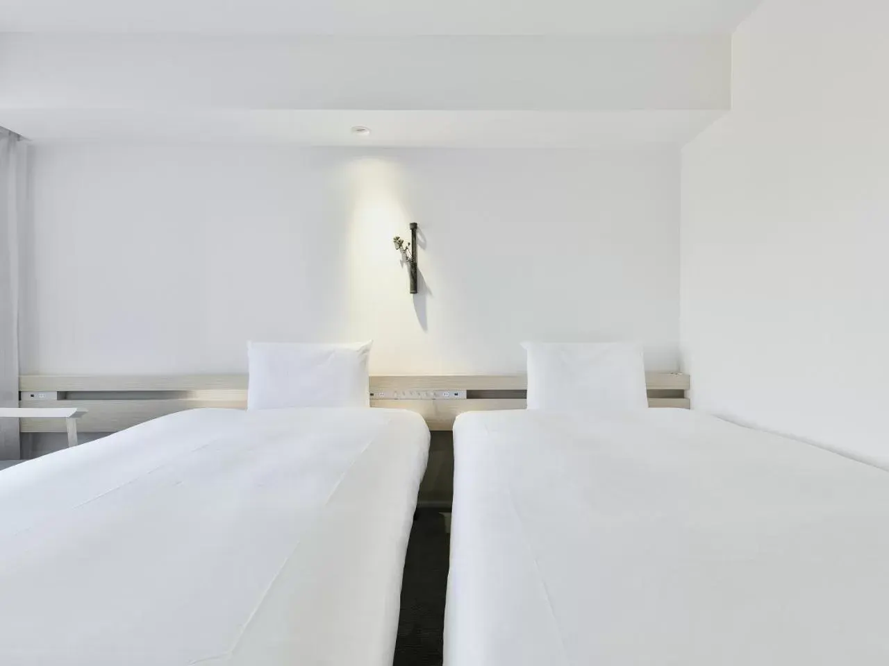 Bed in REF Kumamoto by VESSEL HOTELS