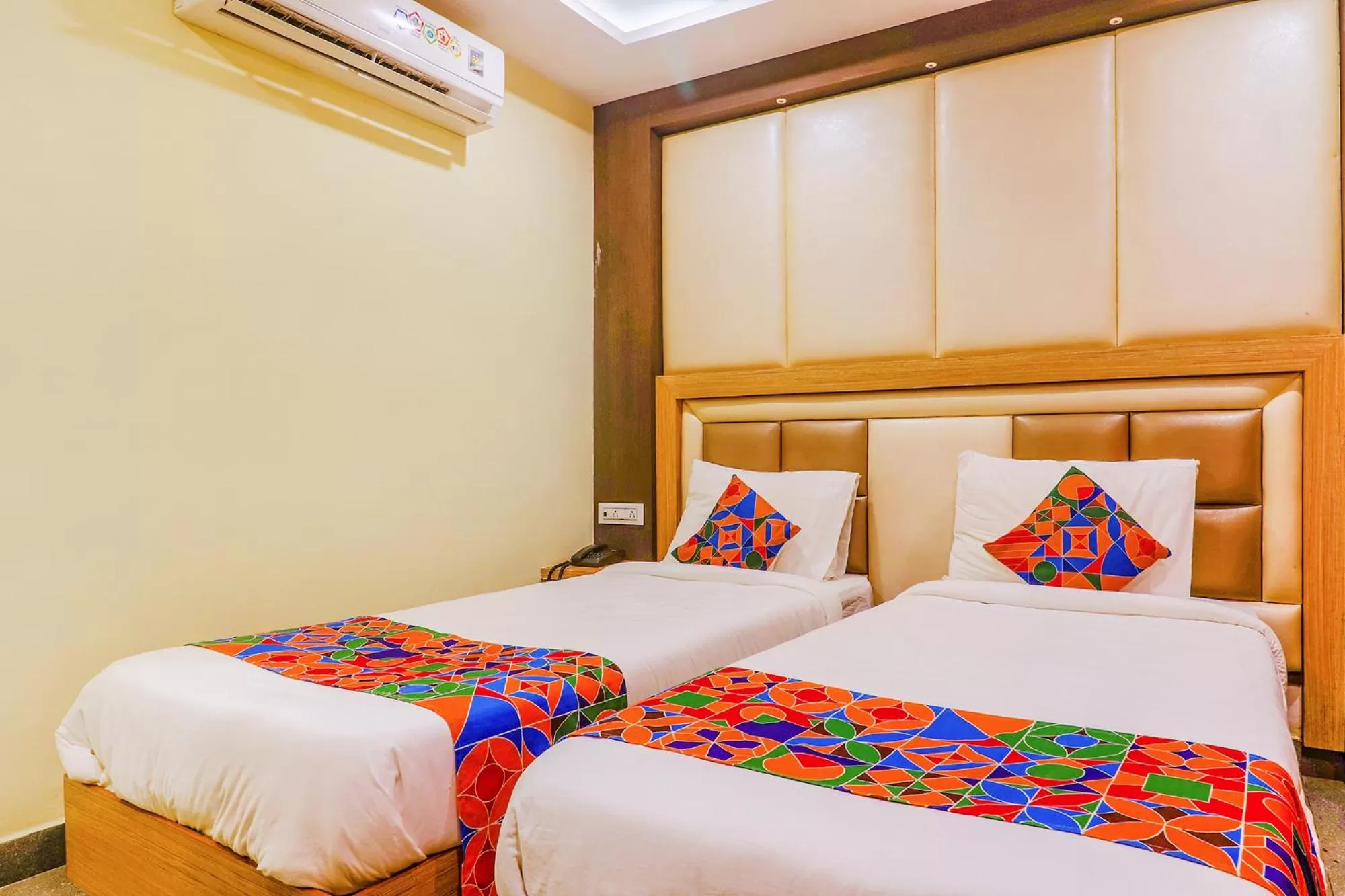 Bed in FabHotel Keerthi's Anupama - Nr Indira Gandhi Stadium