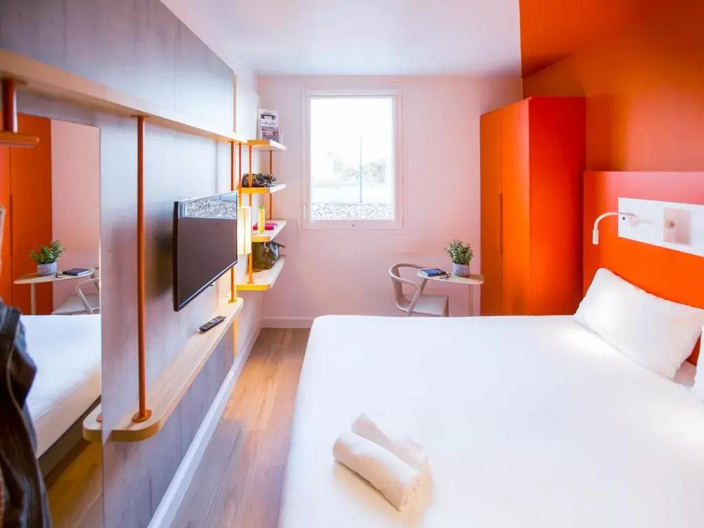Bedroom in Ibis Budget Montpellier Nord Euromédecine
