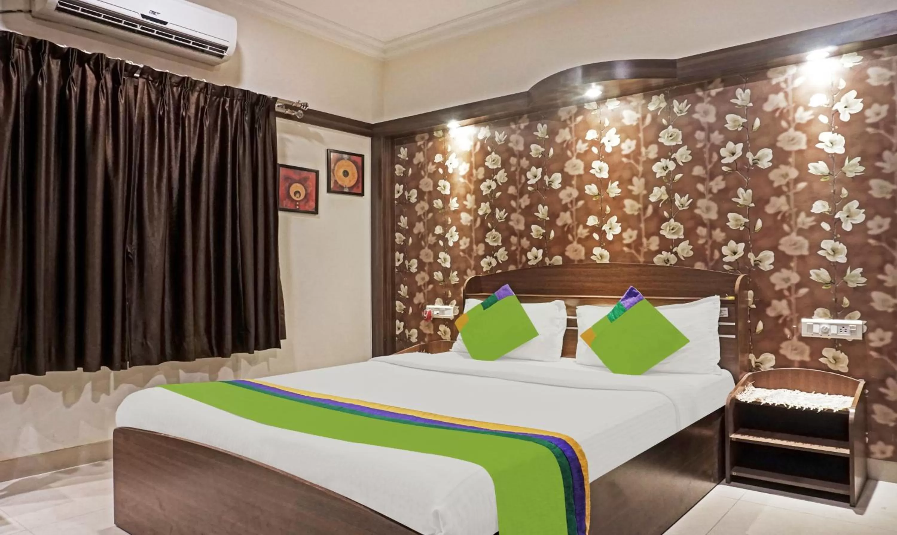 Bedroom, Bed in Treebo Excellent Home