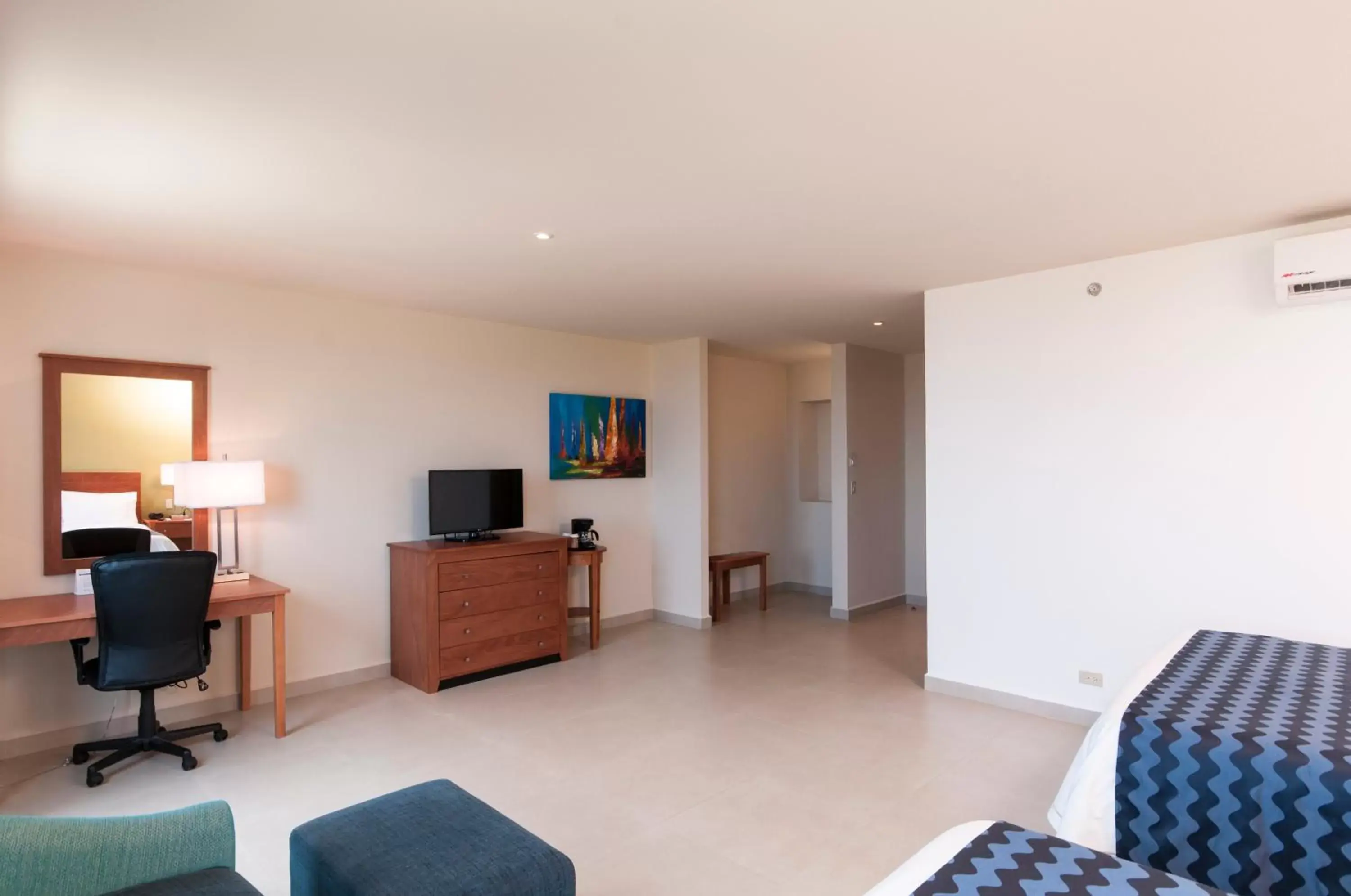 Photo of the whole room, TV/Entertainment Center in Holiday Inn Express Cabo San Lucas, an IHG Hotel