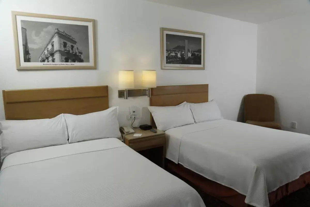 Photo of the whole room, Bed in Hotel Monterrey Macroplaza