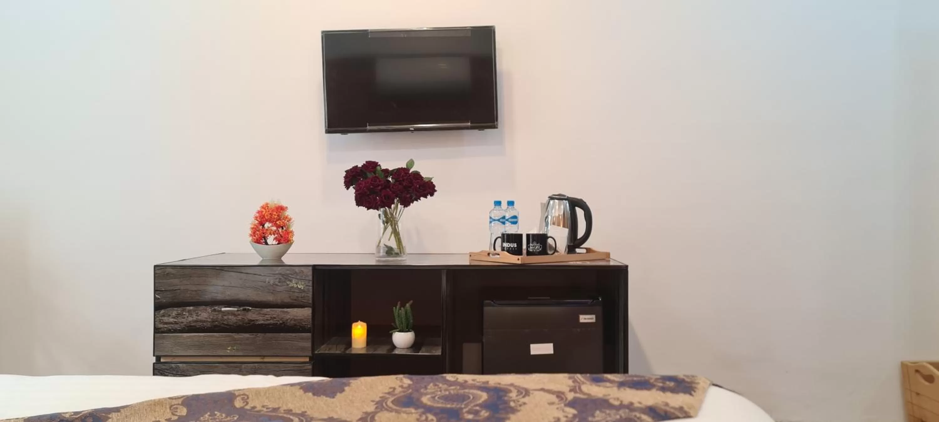 Communal lounge/ TV room in Indus Lodges Gilgit