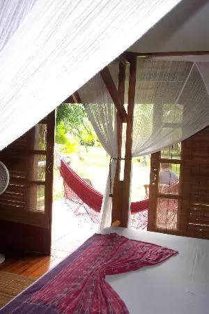 View (from property/room), Bed in Acajou Hotel