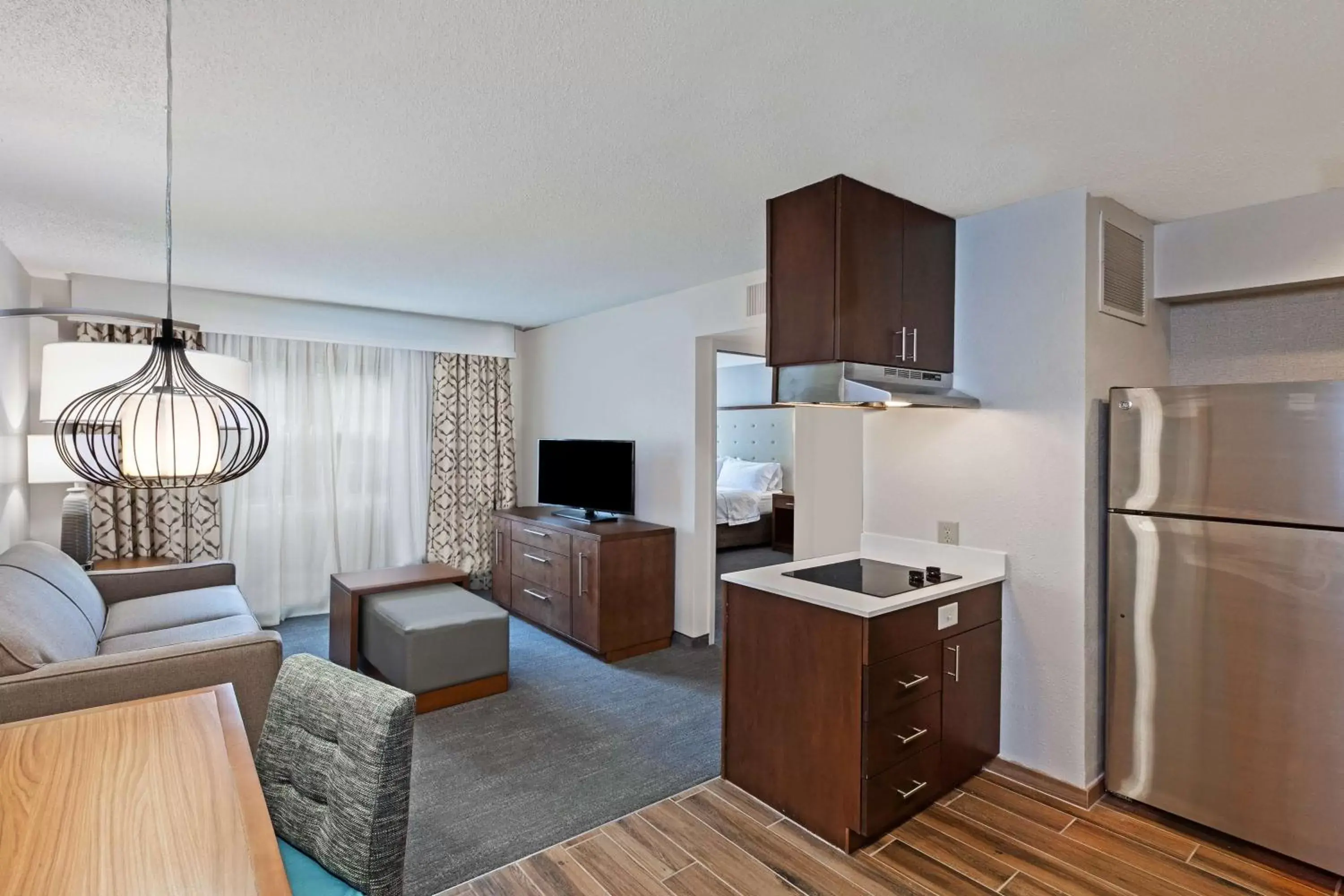 Bedroom, TV/Entertainment Center in Homewood Suites by Hilton Greensboro