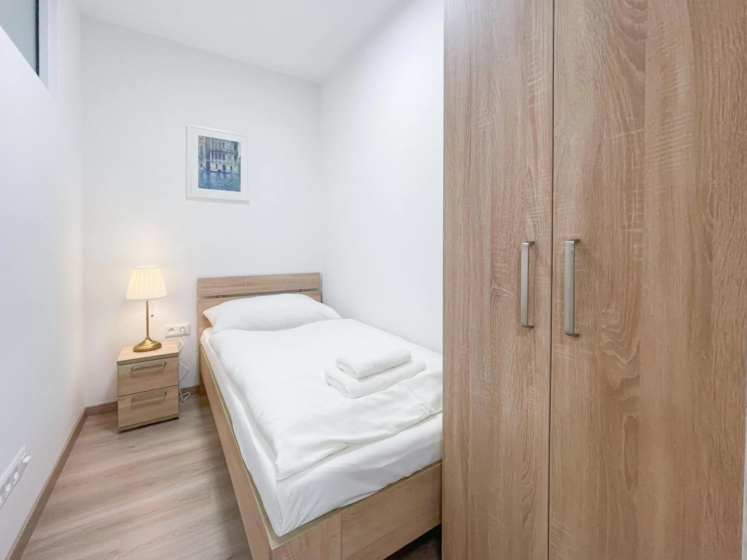 Bed in Metropolitan Star Apart Hotel