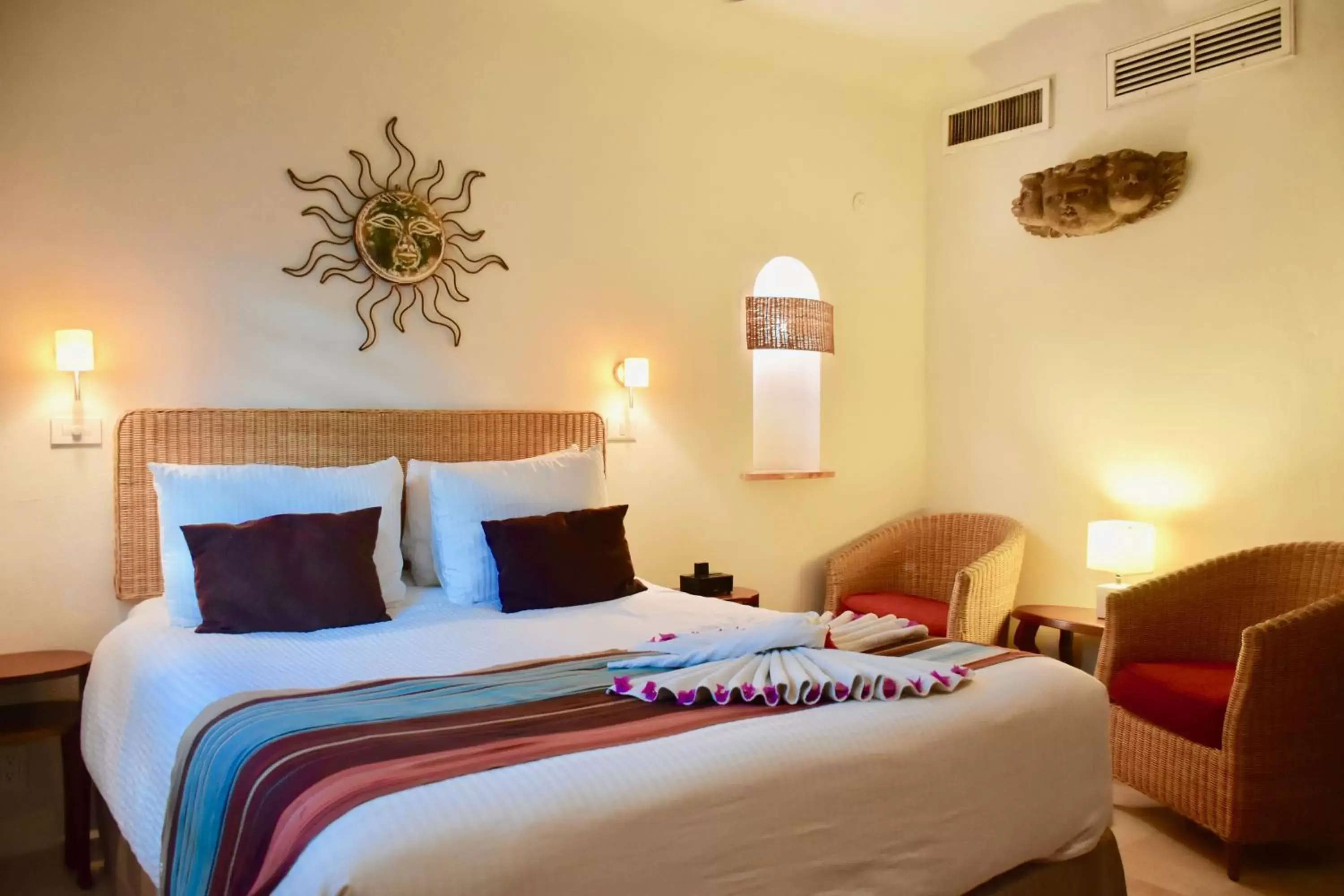 Bed in Playa Palms Beach Hotel