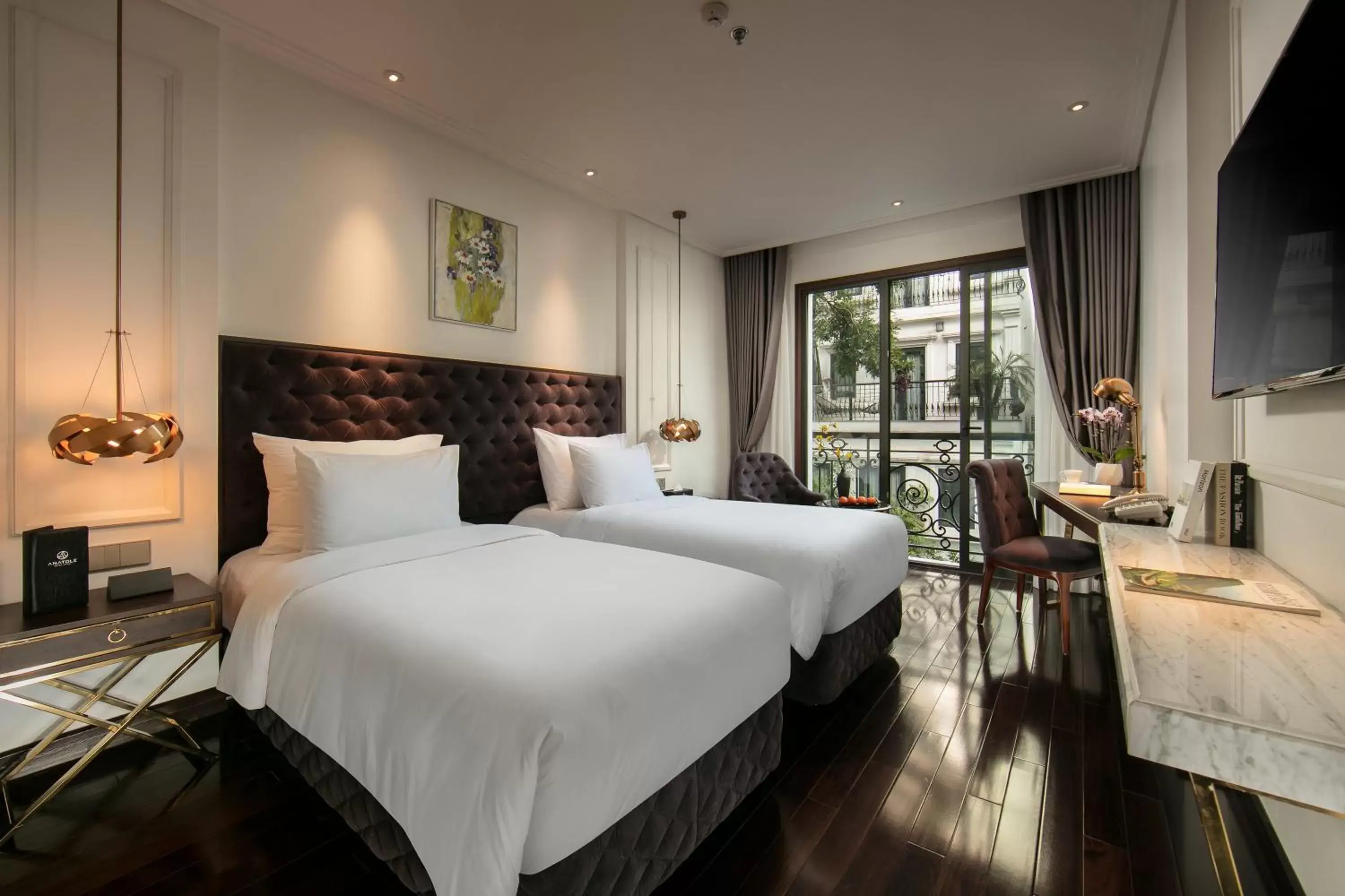 Bed in Anatole Hotel Hanoi
