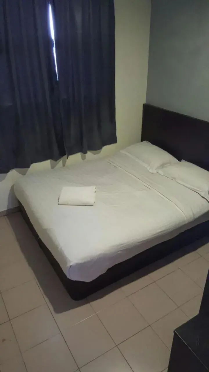 Bed in Tiong Nam Hotel
