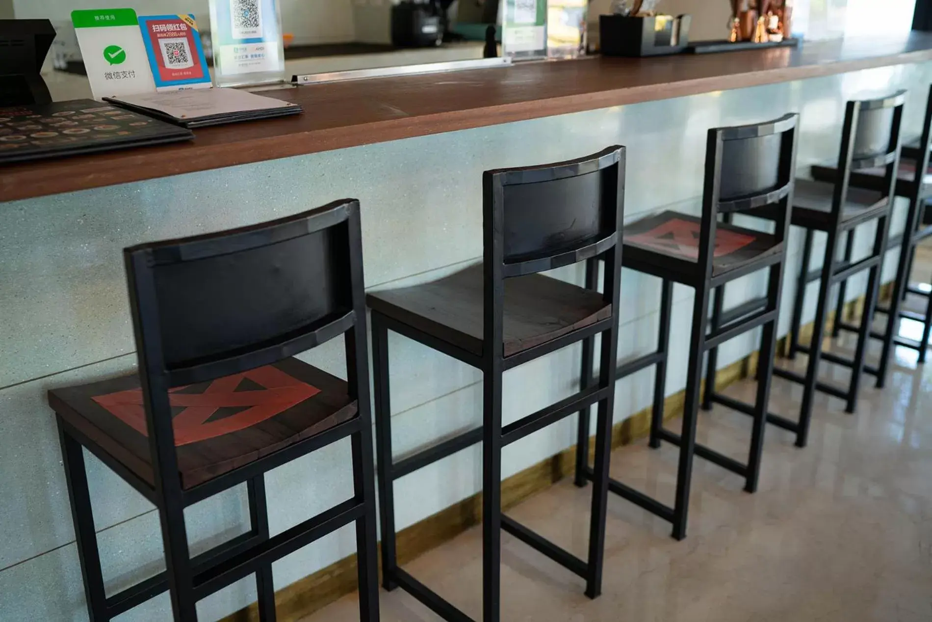 Lounge or bar in Grand Livio Kuta Hotel Lounge or bar in Grand Livio Kuta Hotel