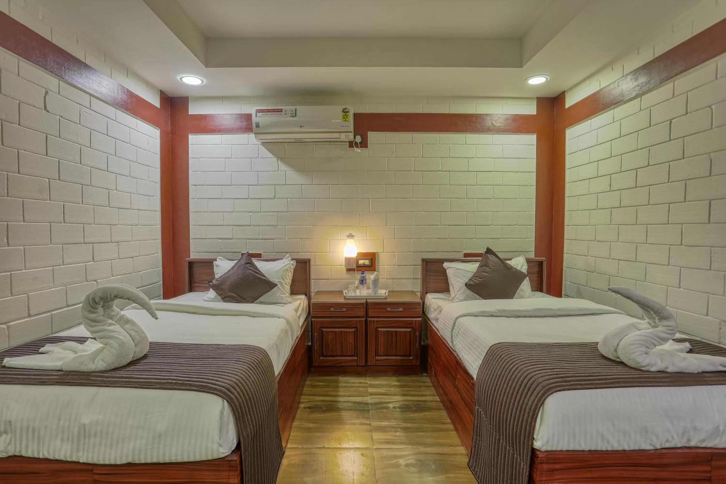 Bed in LEISURE VALLEY BEACH RESORT