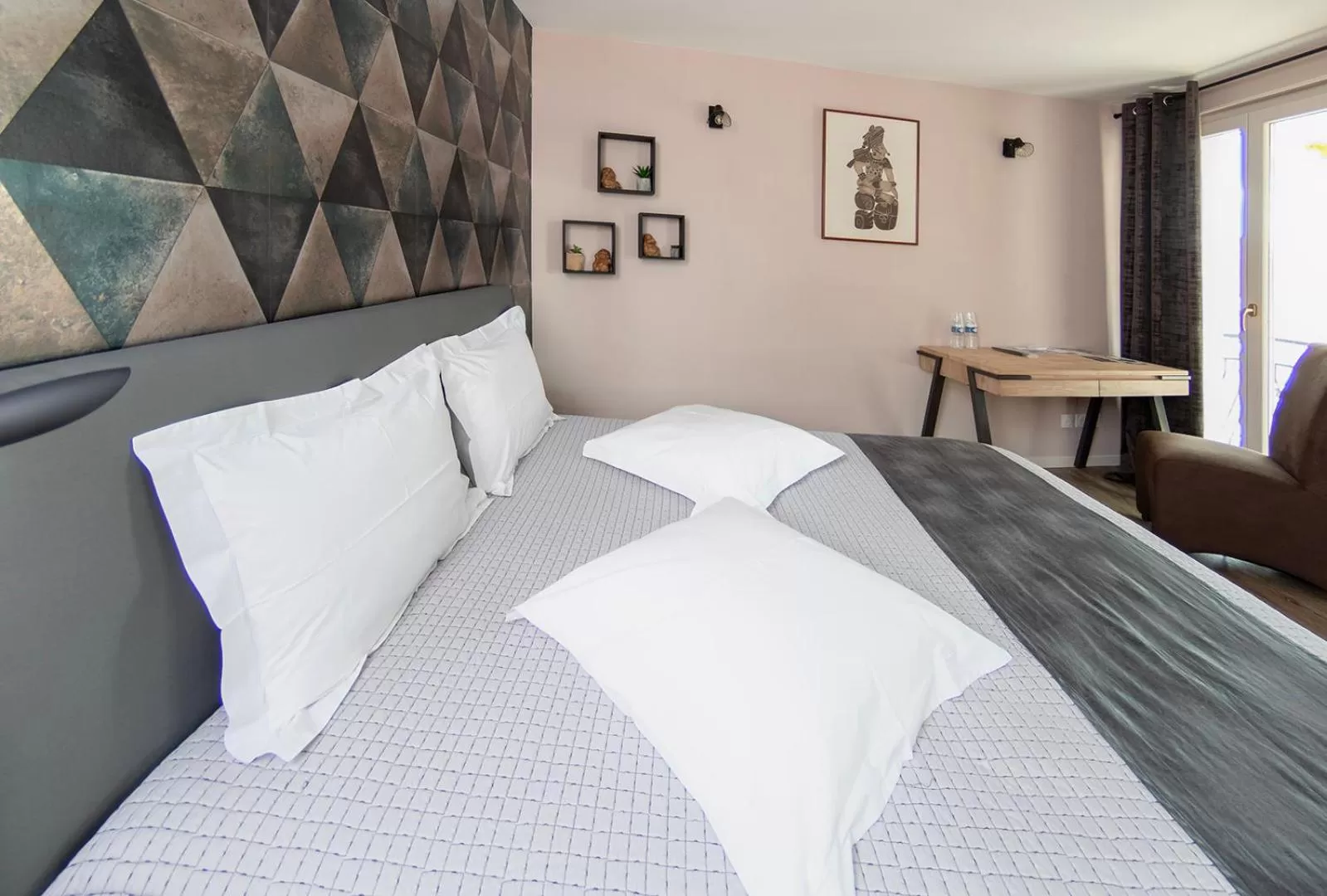 Bed in Le Relais de la Poste