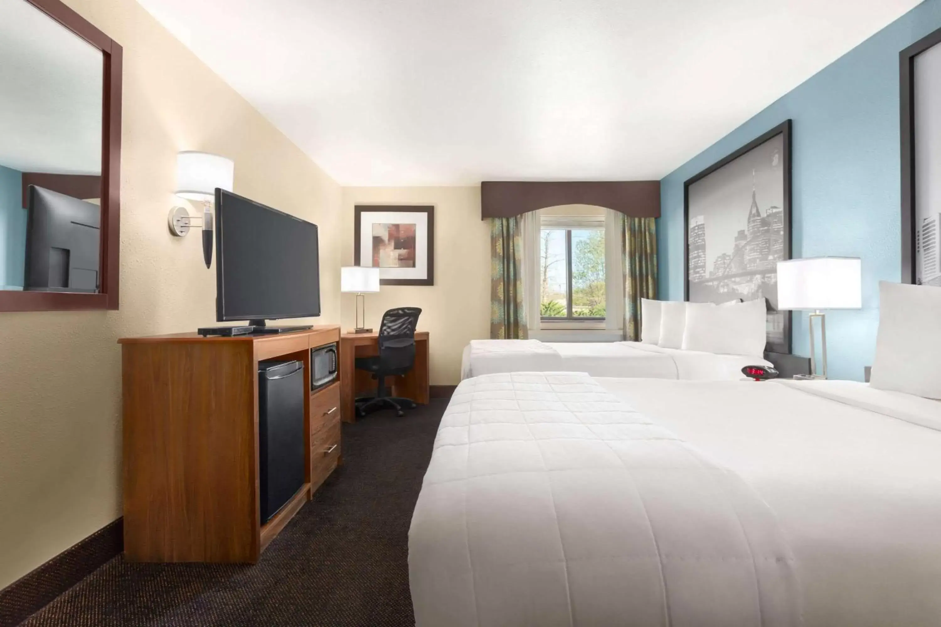 Bedroom in Super 8 by Wyndham Nashville Airport North