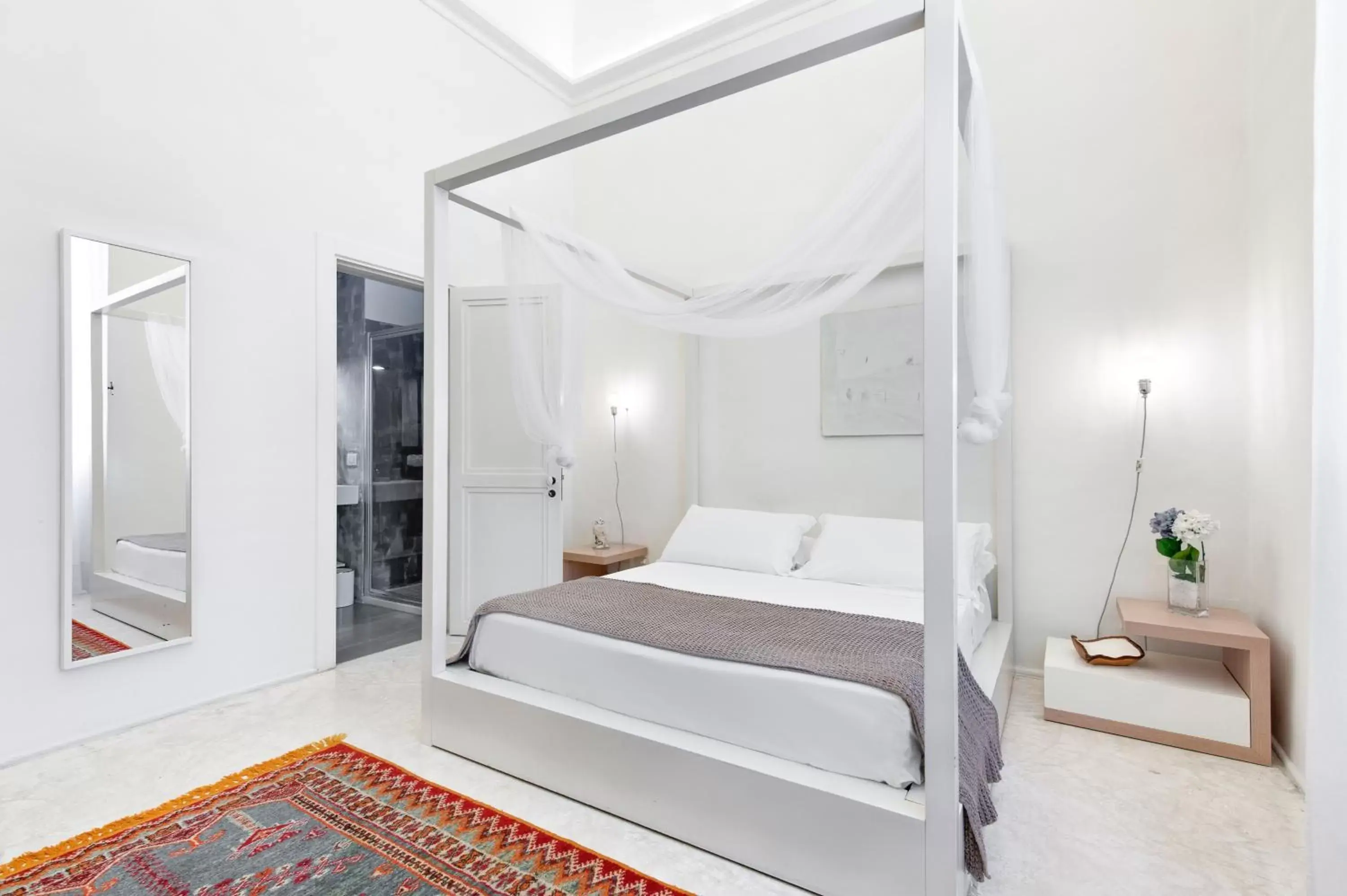 Bed in Casa di Lo Suites