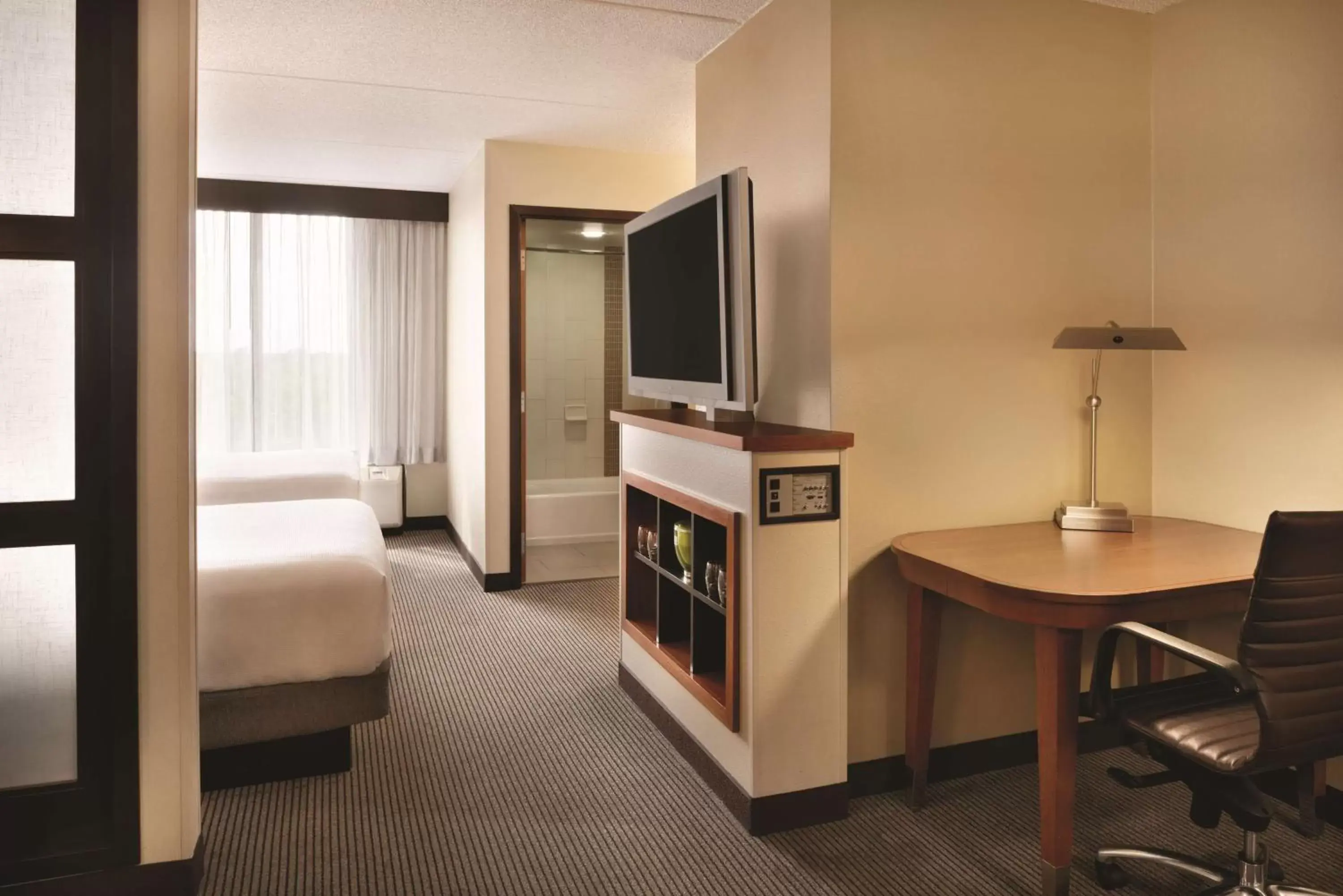Photo of the whole room, TV/Entertainment Center in Hyatt Place Chicago Hoffman Estates