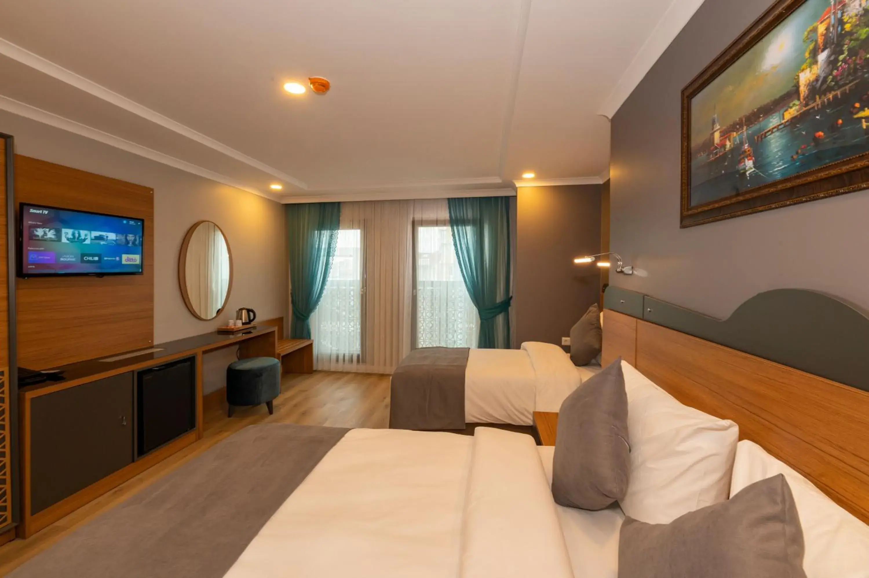 Communal lounge/ TV room in New Emin Hotel
