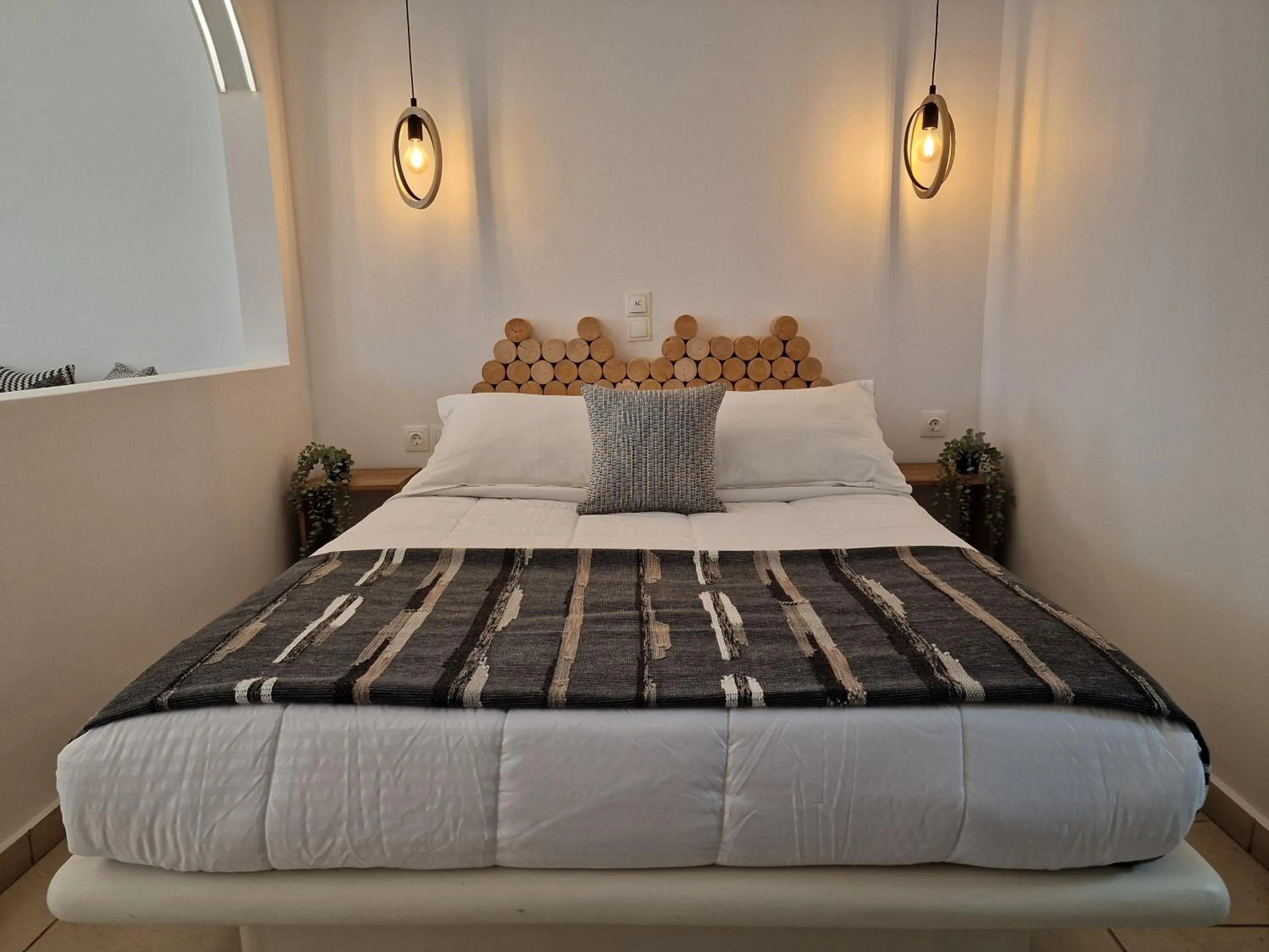 Bedroom in Amerisa Suites & Villa