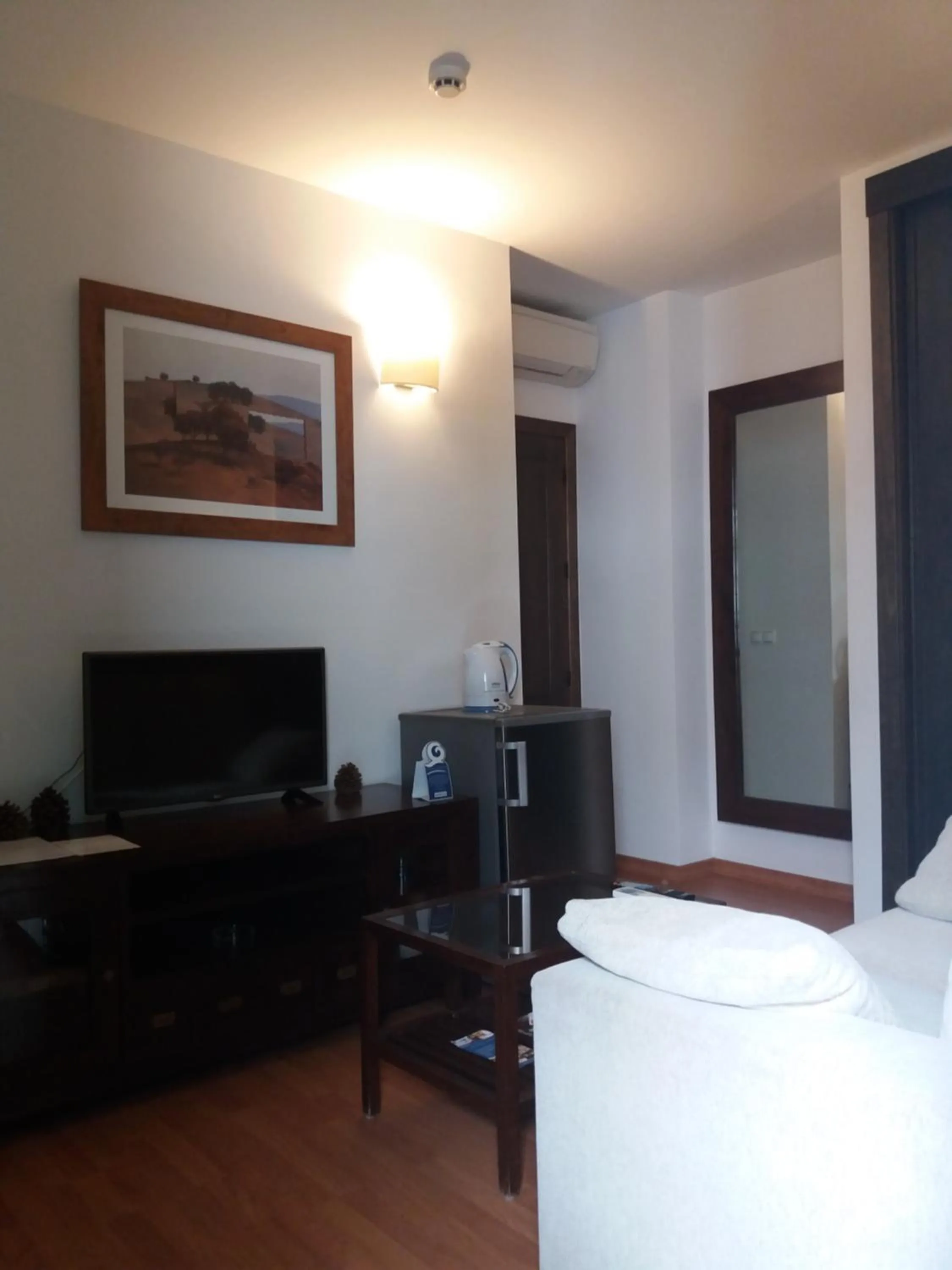 Living room, Bed in Apartamentos Ardales