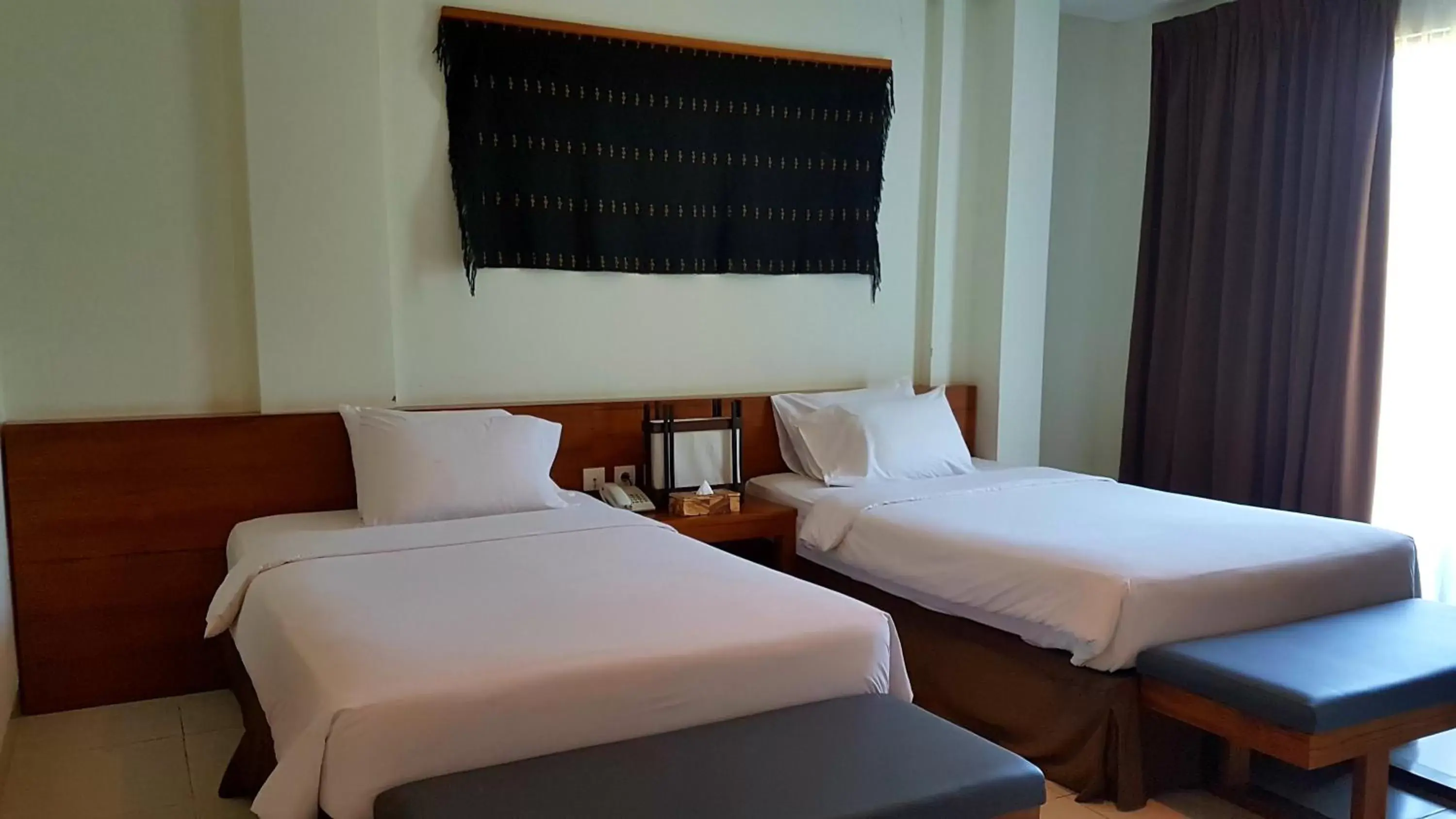 Bed in Luwansa Beach Hotel