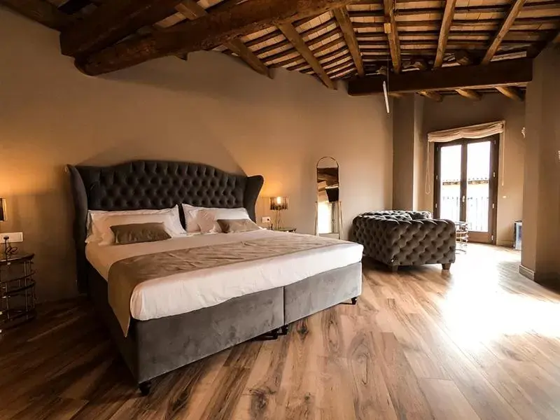 Bed in Les Clarisses Boutique Hotel