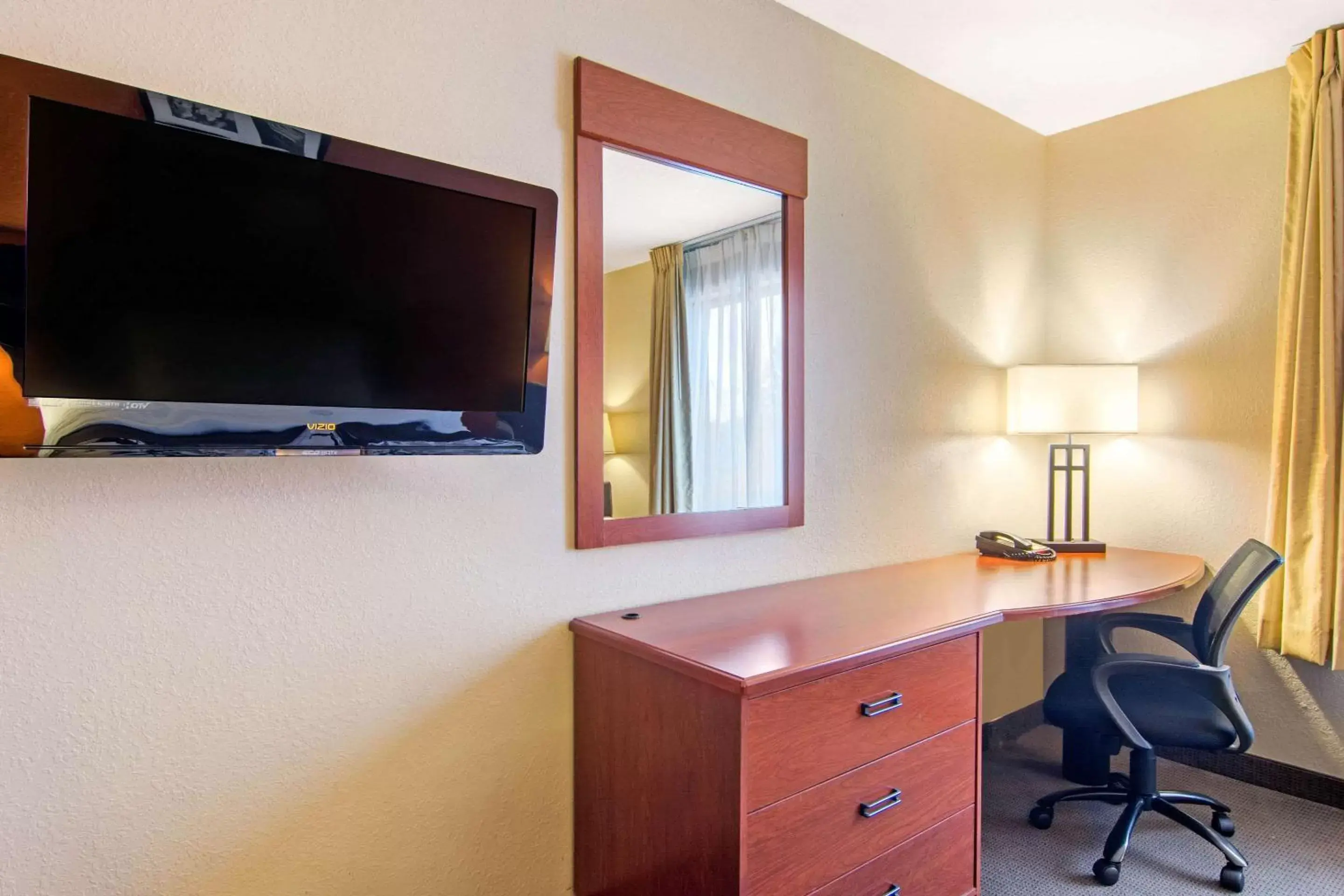 Photo of the whole room, TV/Entertainment Center in Sleep Inn & Suites