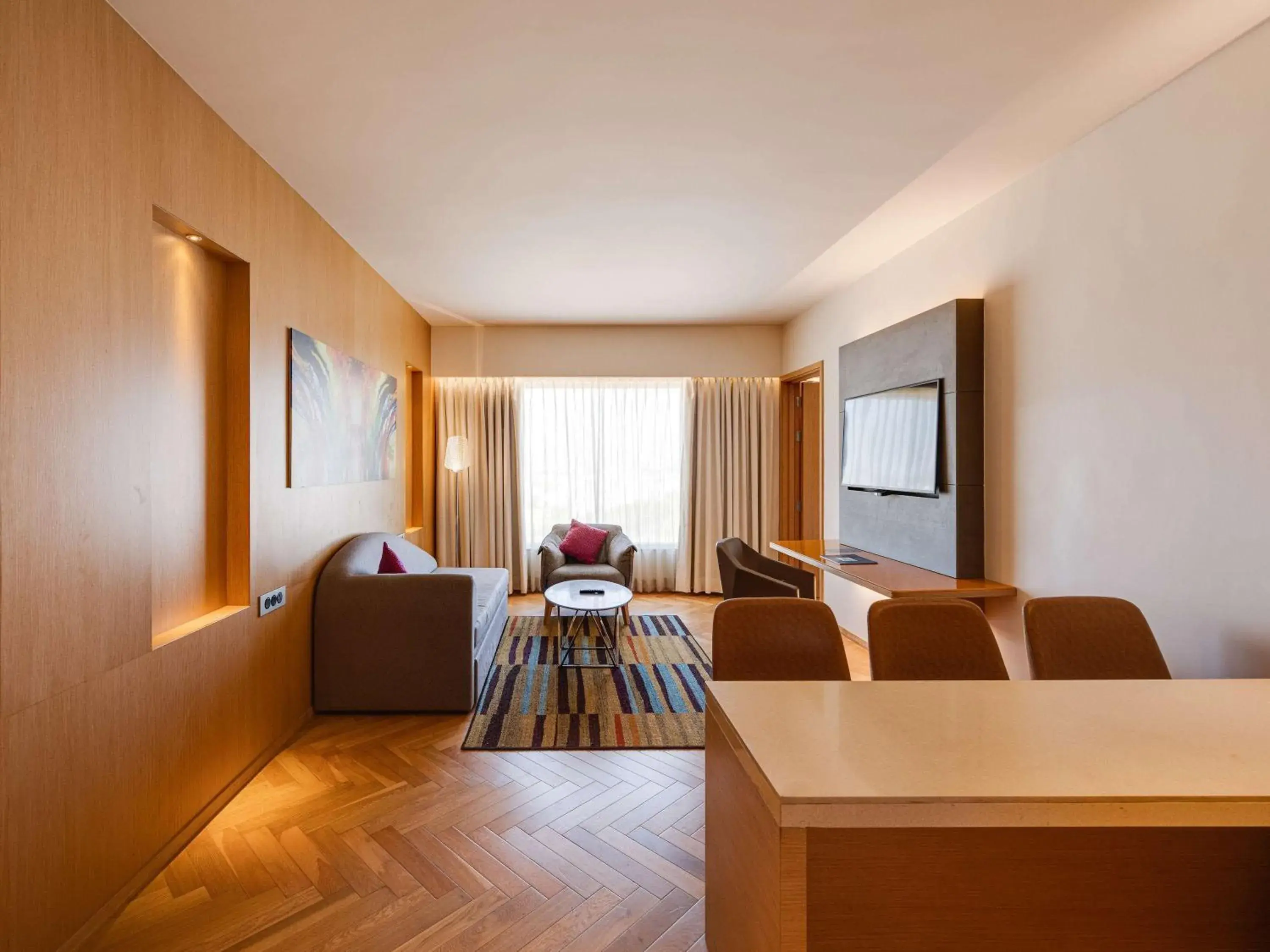 Bedroom, Seating Area in Novotel Vijayawada Varun