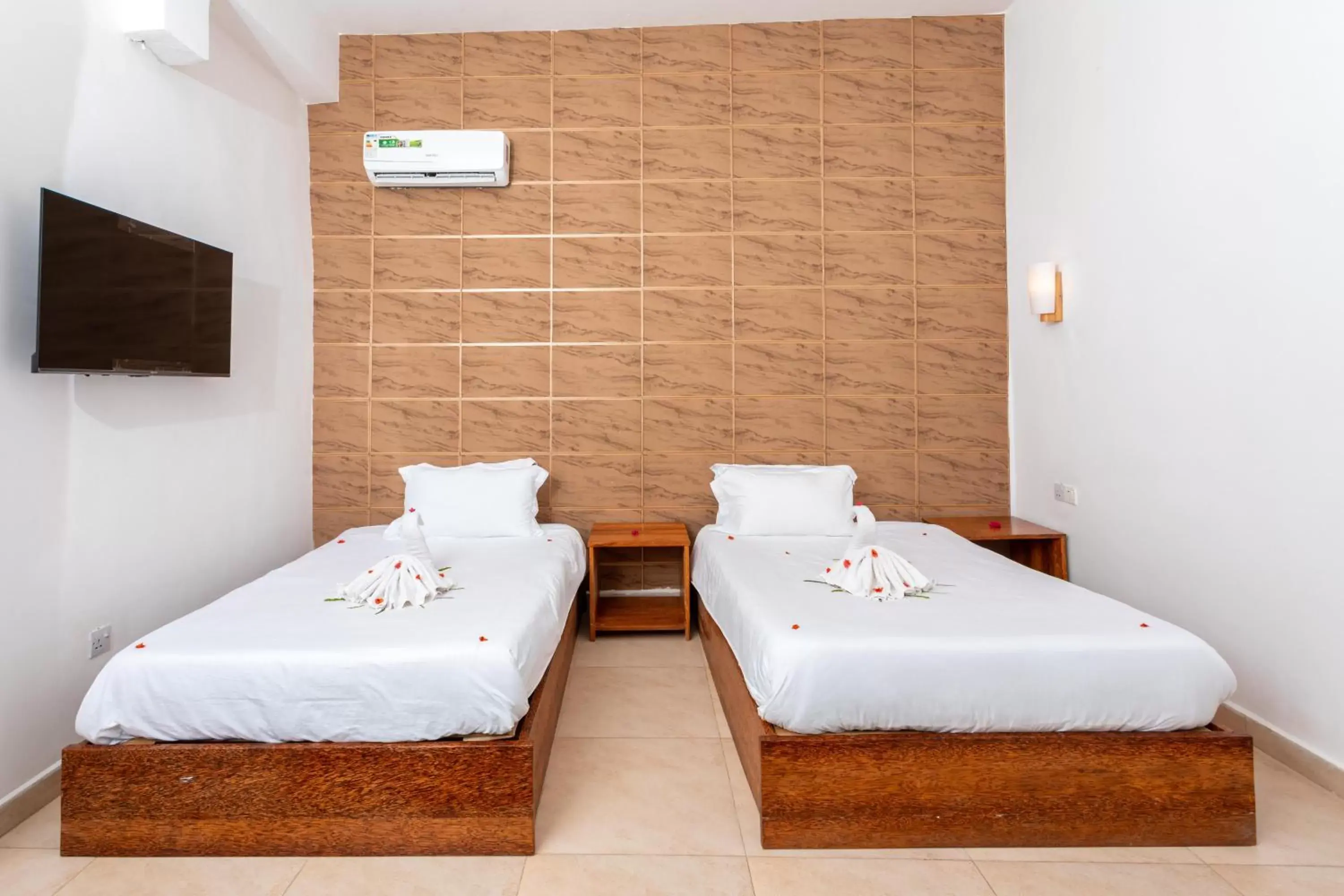 Bed in Canary Nungwi Hotel & Free SPA