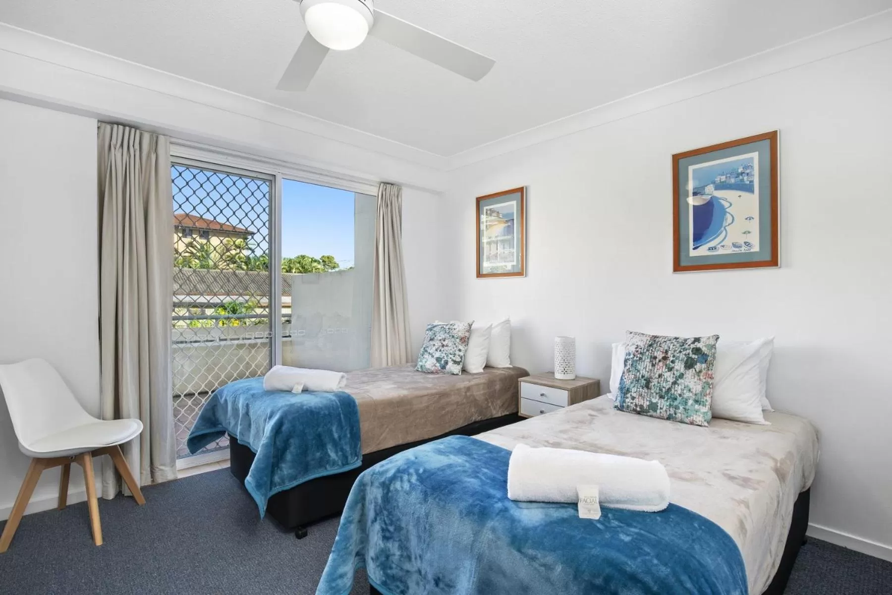 Bed in Kirra Palms Holiday Apartments
